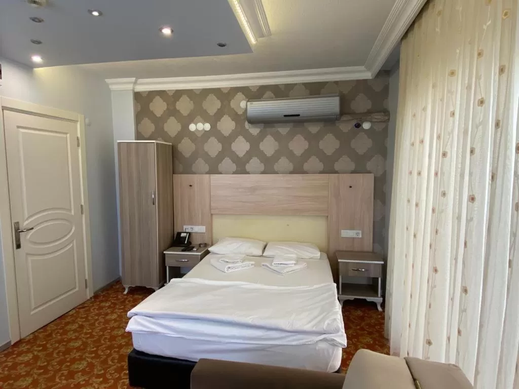 Photo of the whole room, Bed in Sakran Hotel