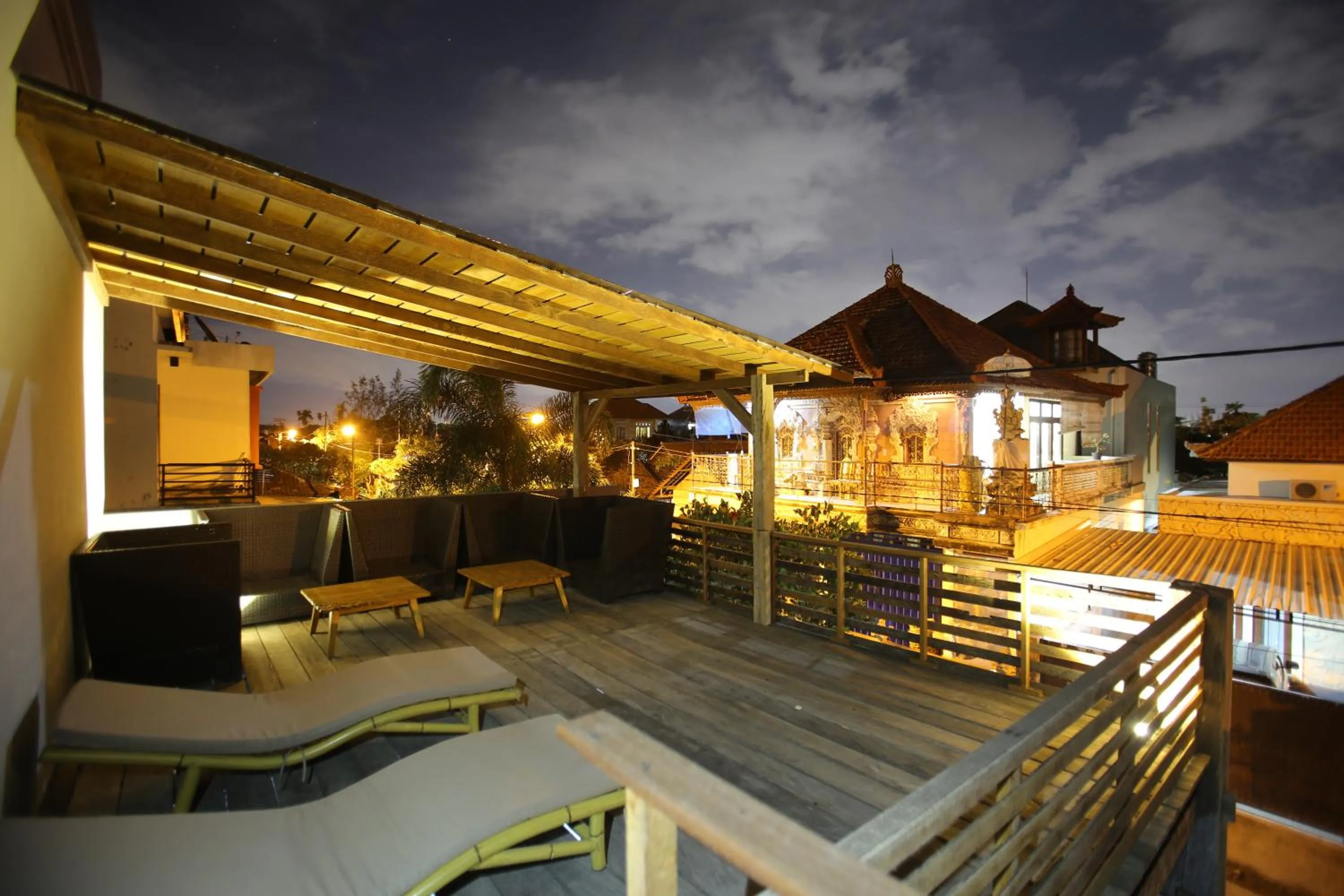 Communal lounge/ TV room in Rai House Sanur