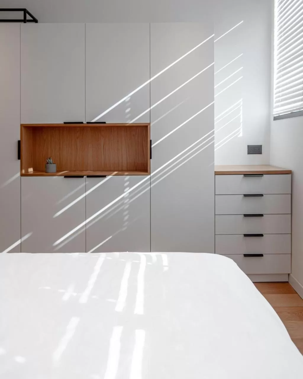 Bed in DeBlox living - Ben Avigdor Apartments