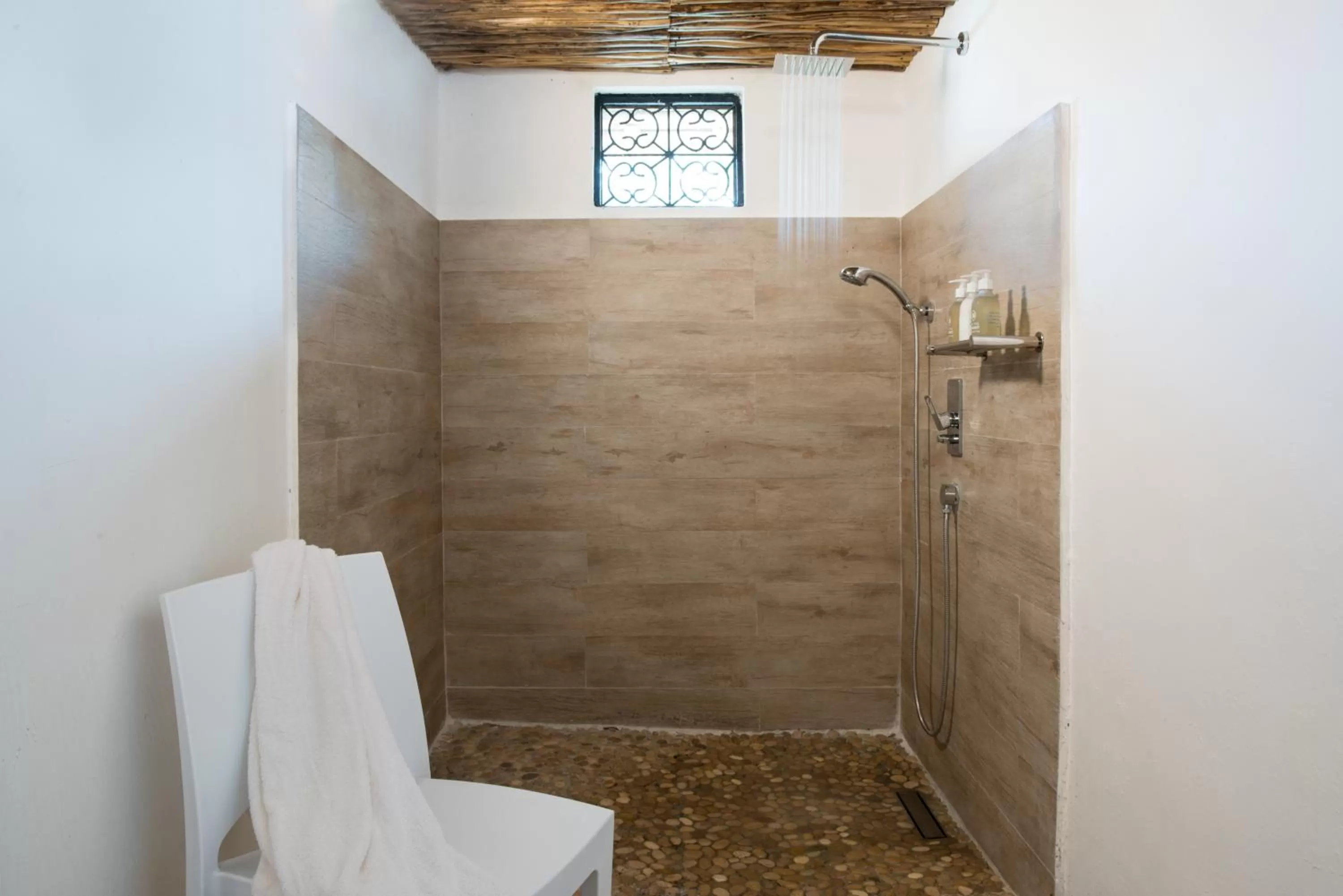 Shower in Chuini Zanzibar Lodge by NEWMARK