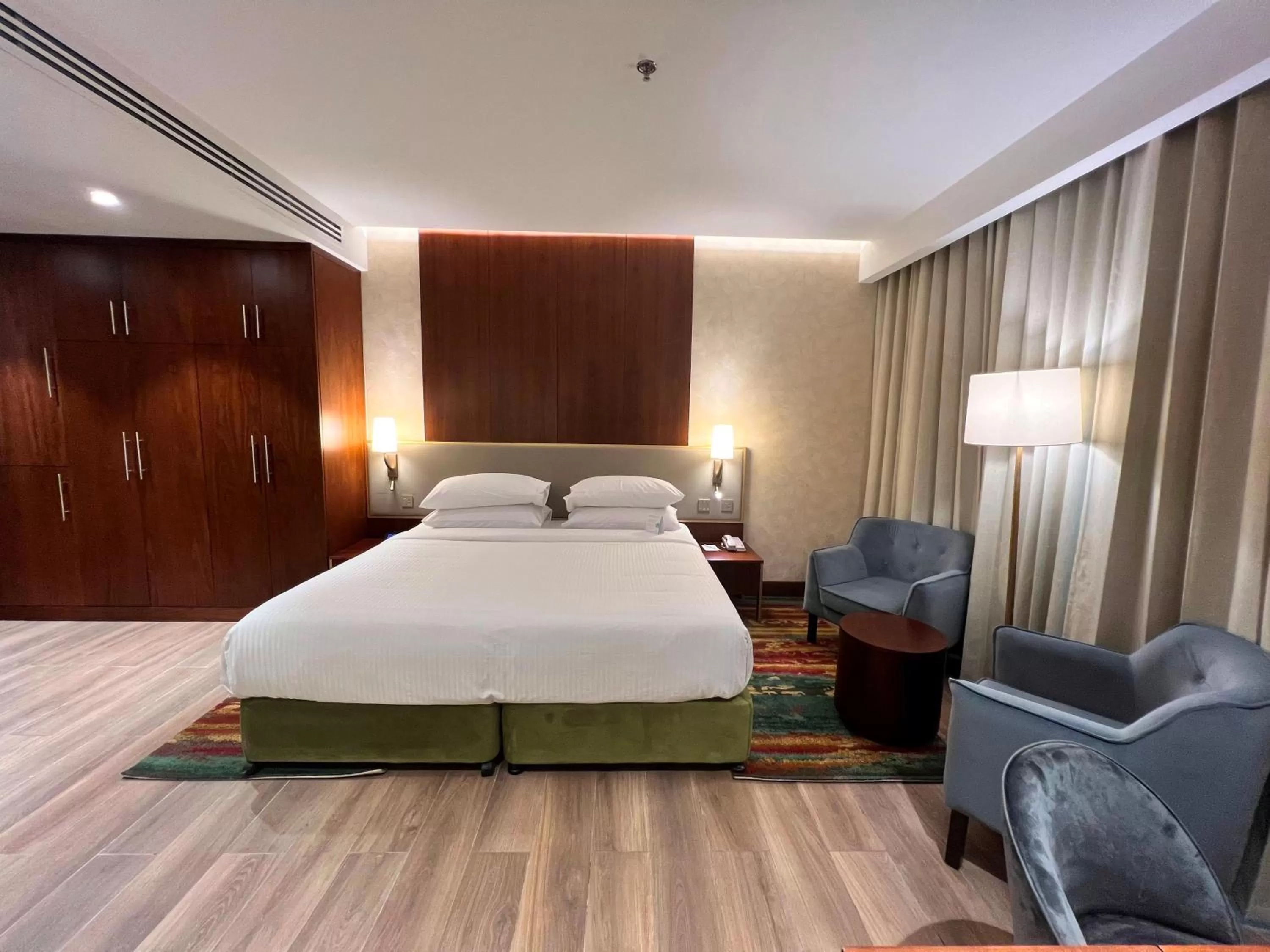 Bedroom, Bed in City Seasons Suites