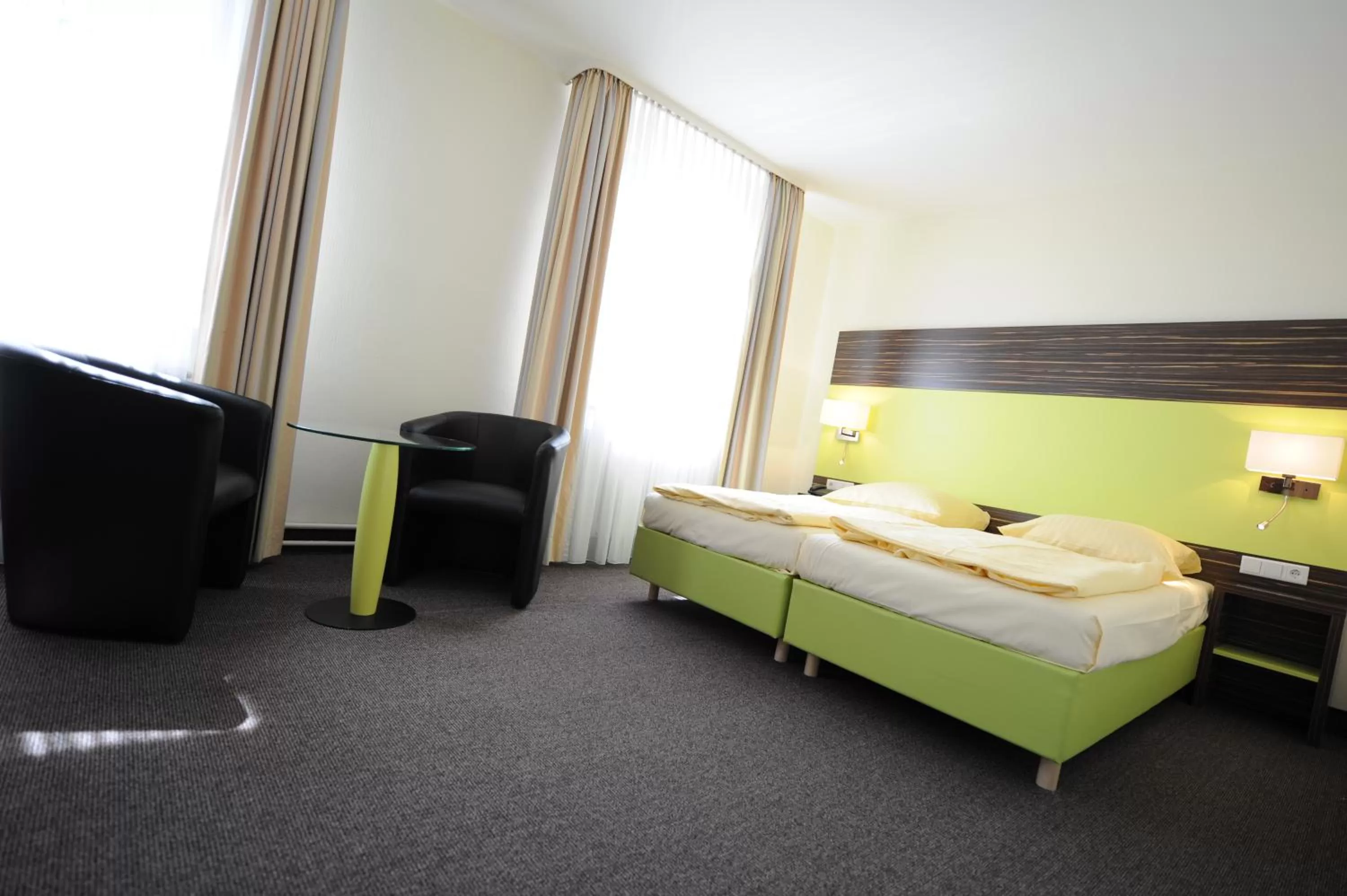 Bed in Behringers City Hotel Nürnberg