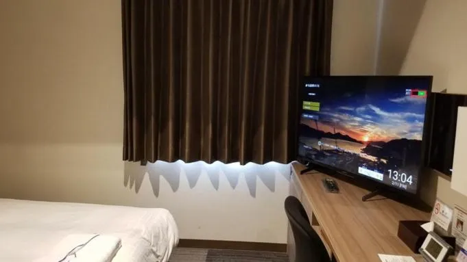 Bed in Onomichi Kokusai Hotel