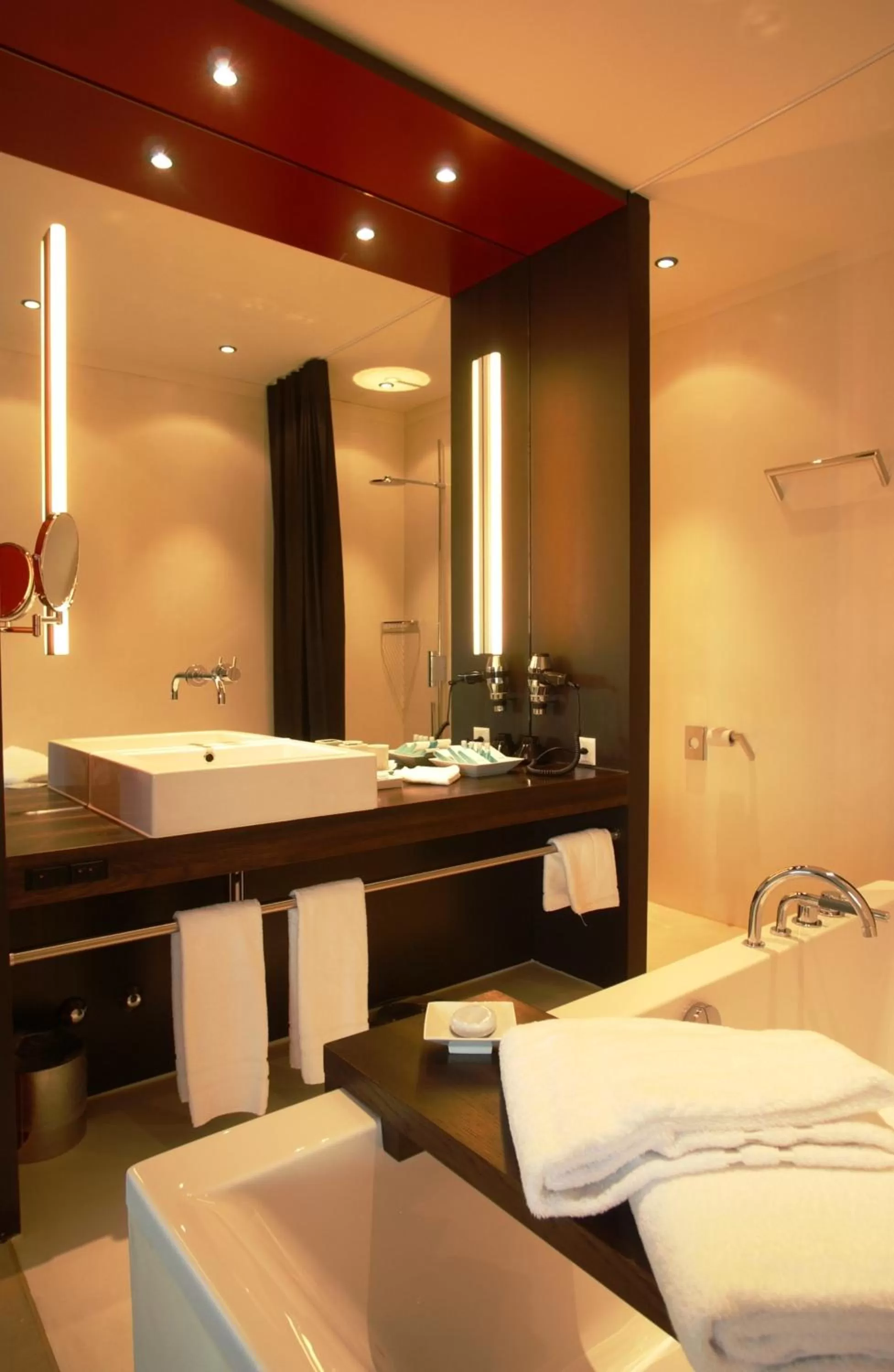 Bathroom, Bed in Sorell Hotel Rigiblick - Studios & Spa Suites
