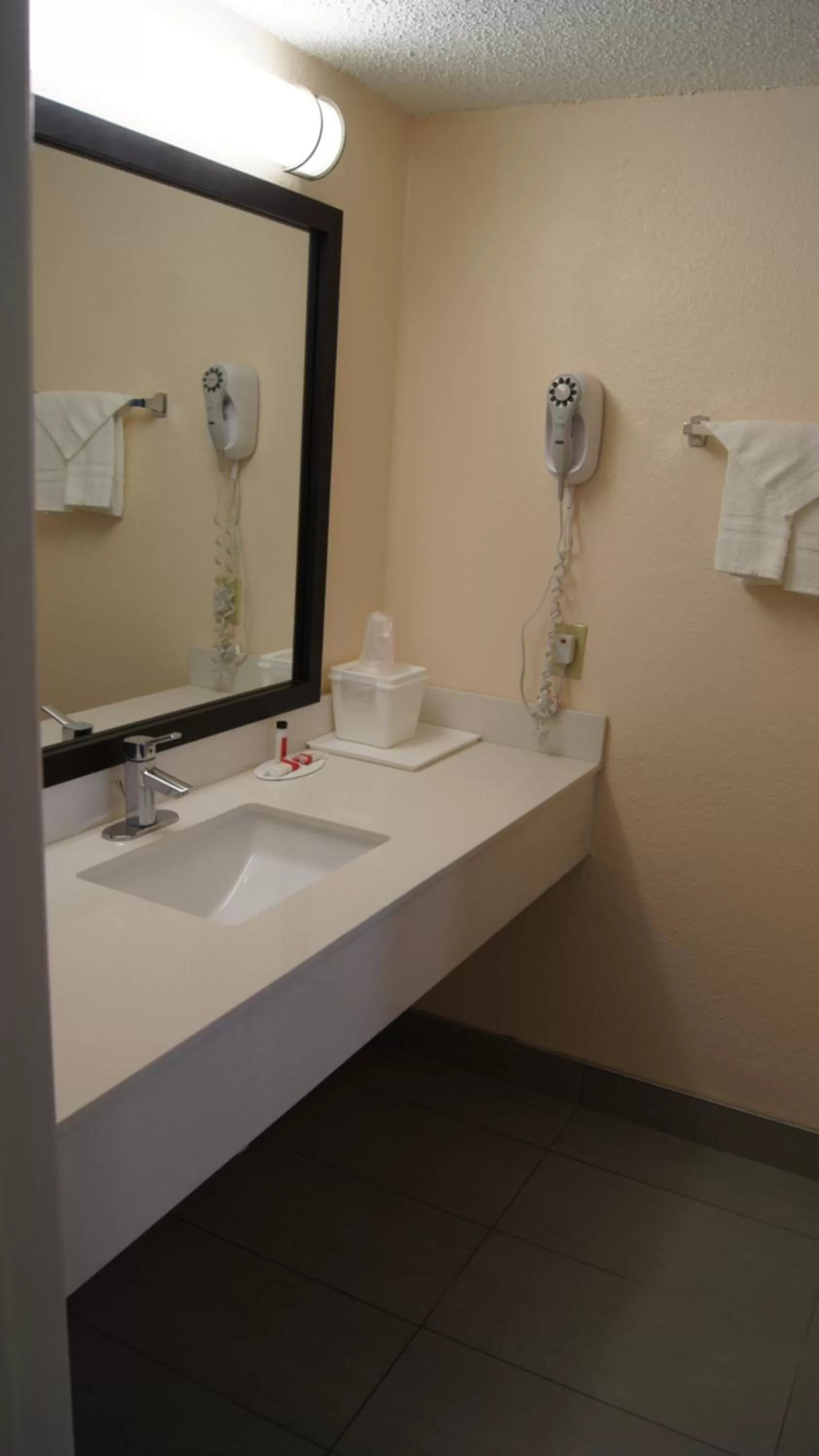 Bathroom in Travelodge by Wyndham North Richland Hills/Dallas/Ft Worth