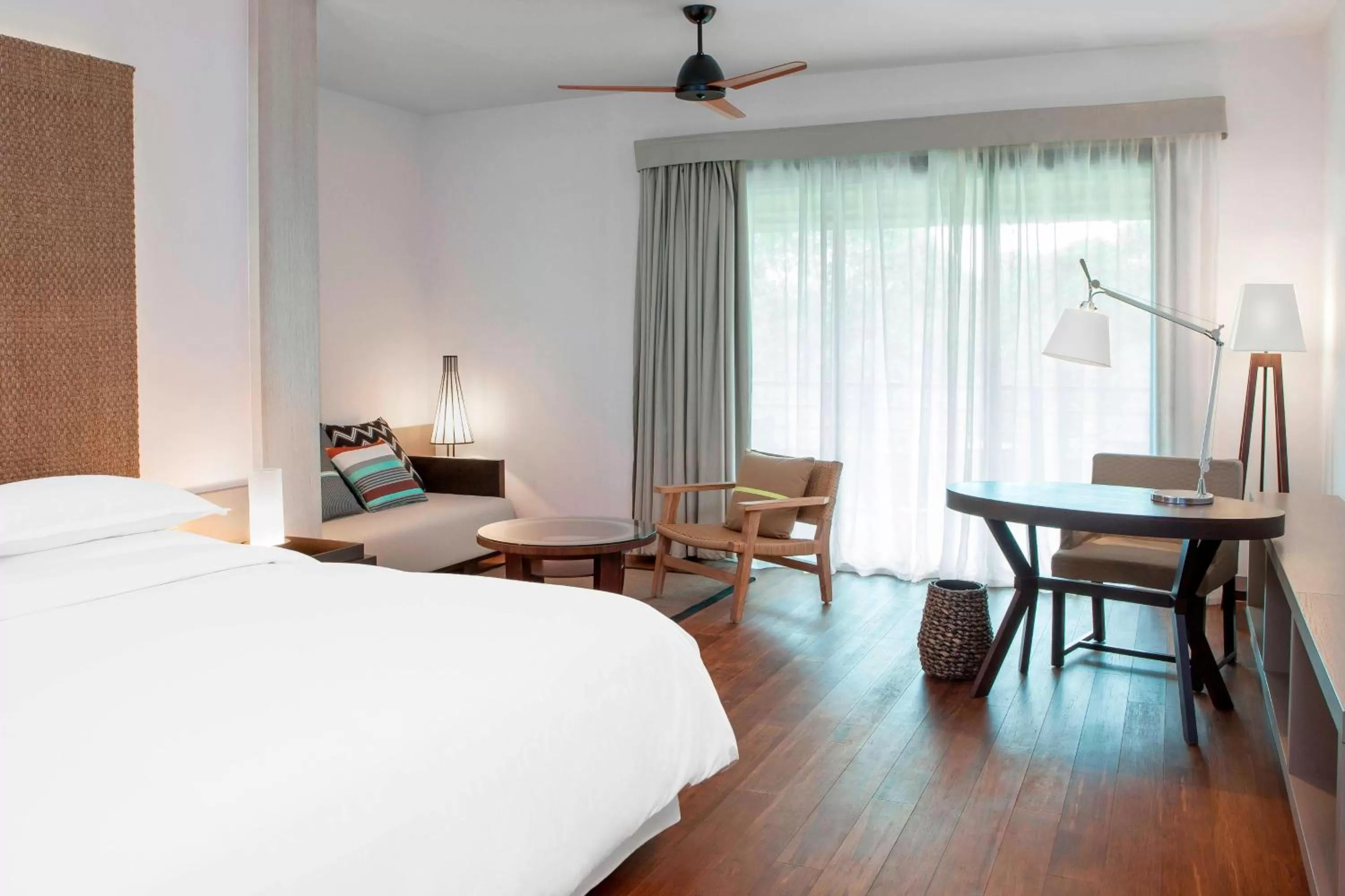 Photo of the whole room, Bed in Sheraton New Caledonia Deva Spa & Golf Resort