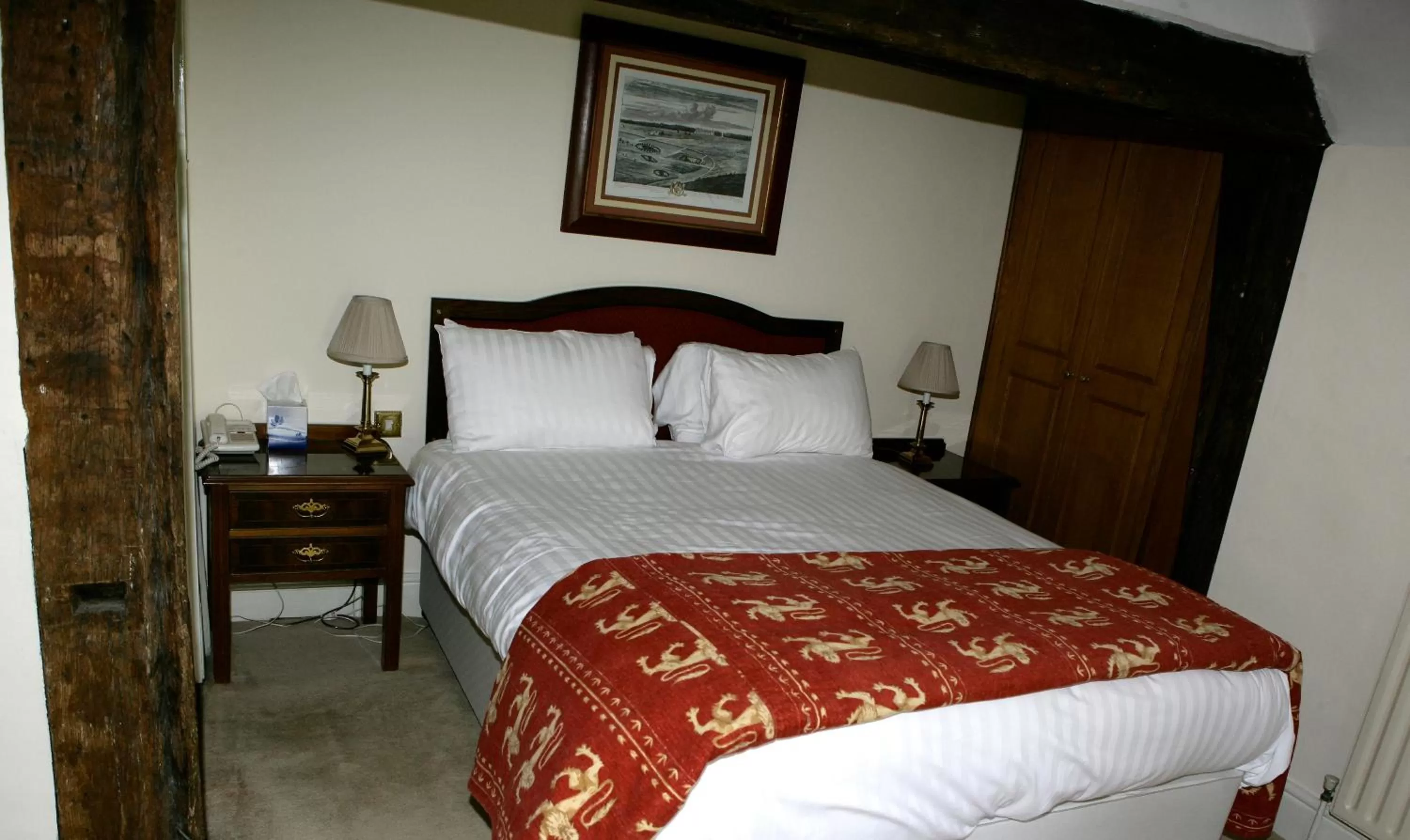 Bed in The Saracens Head Hotel