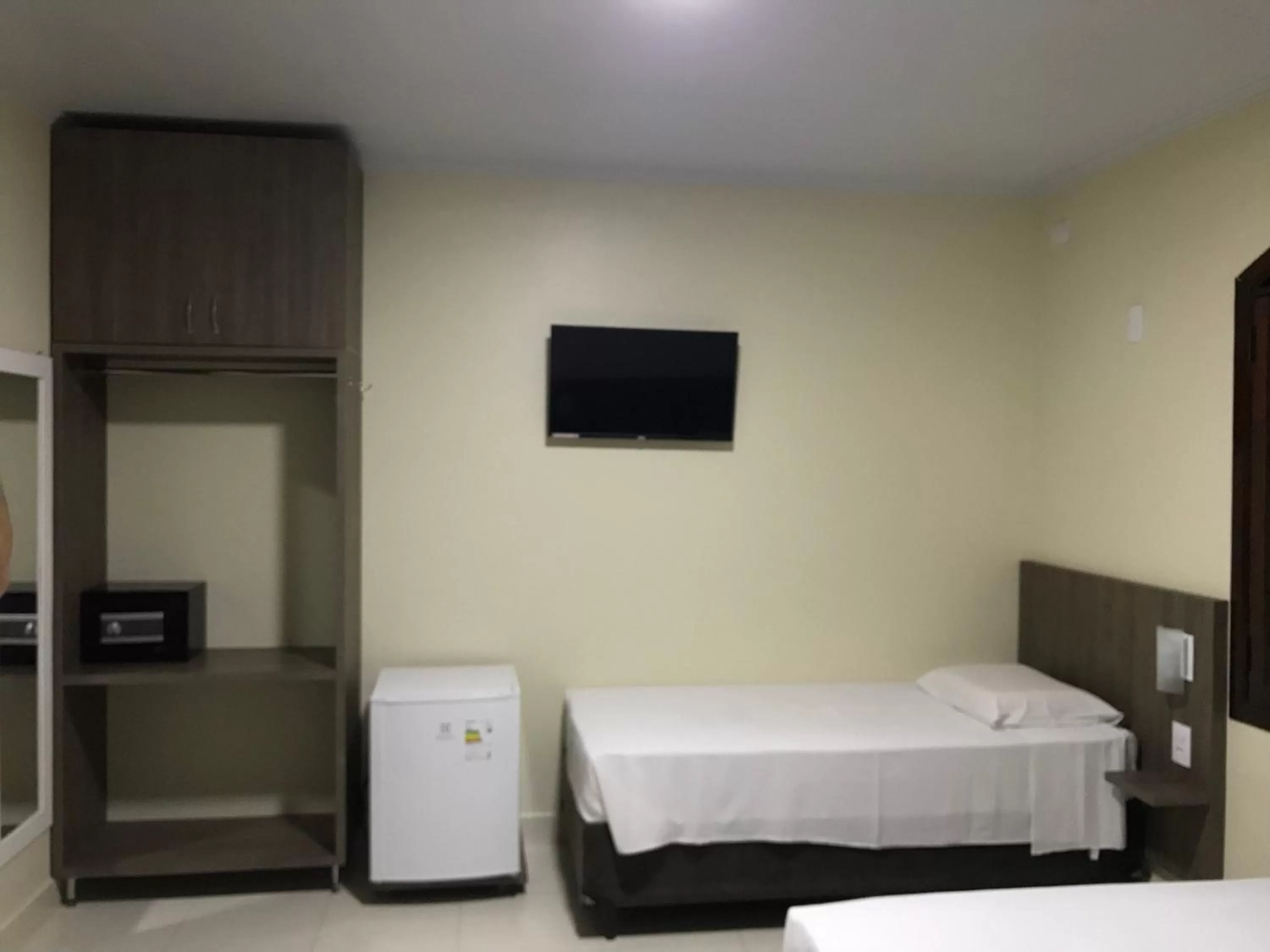 Bed in Pousada El Shaddai