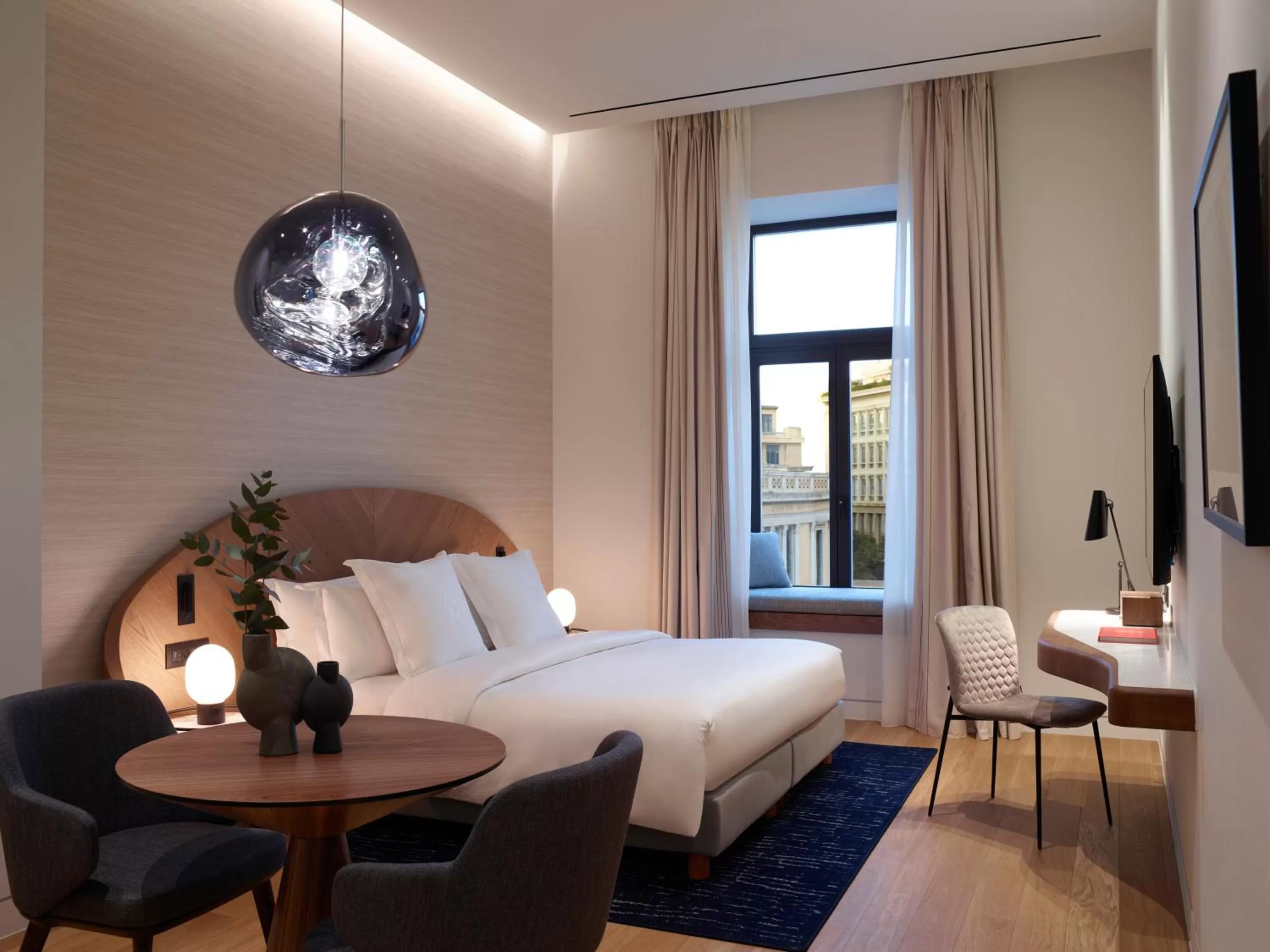 Photo of the whole room, Bed in xenodocheio Milos