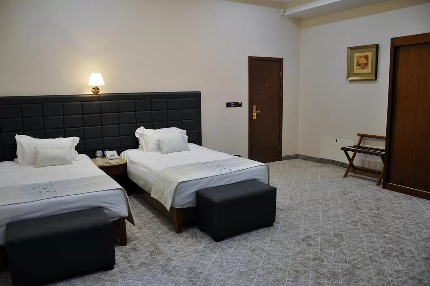 Bed in Parliament Palace Hotel