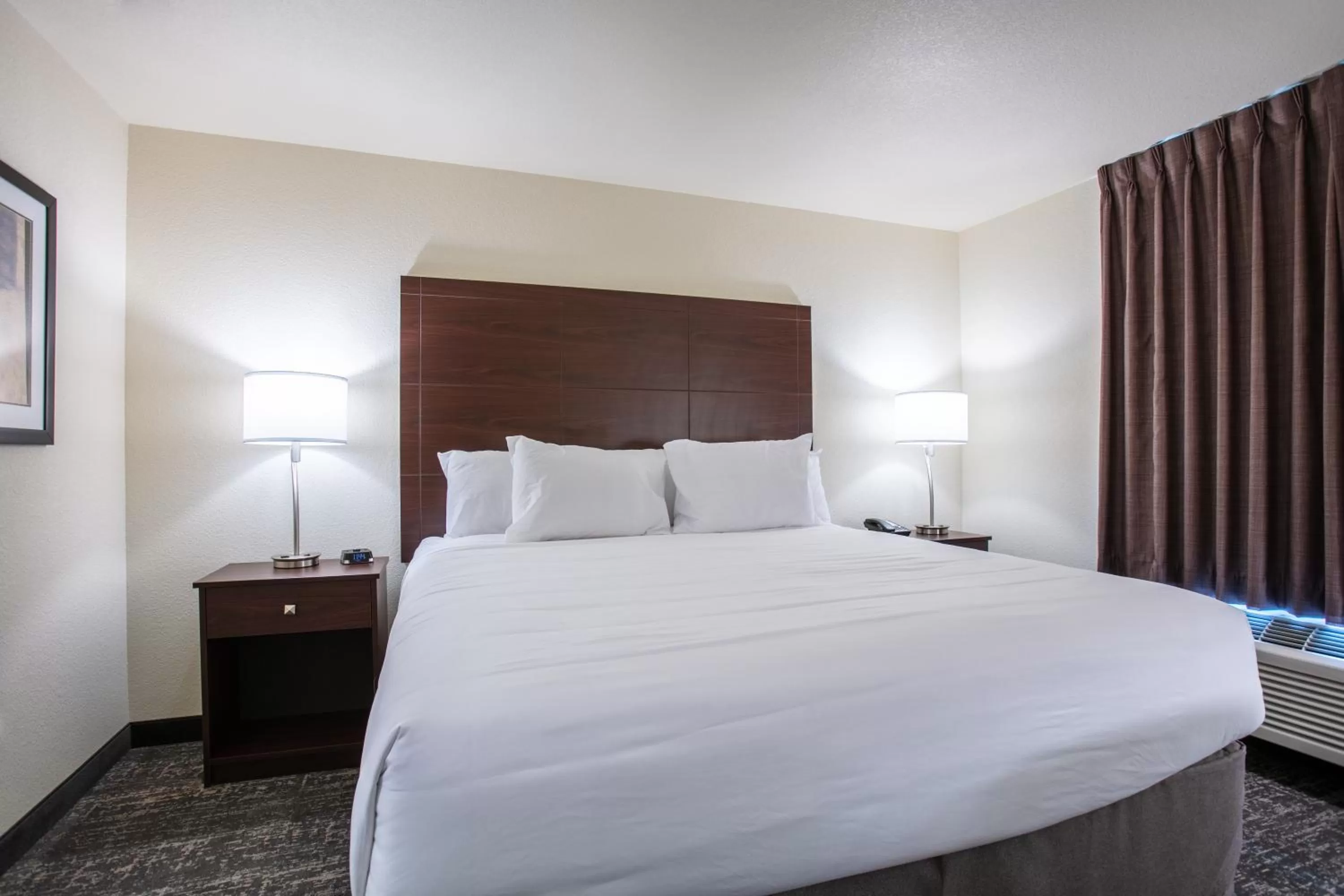 Bed in Cobblestone Inn & Suites - Pine Bluffs