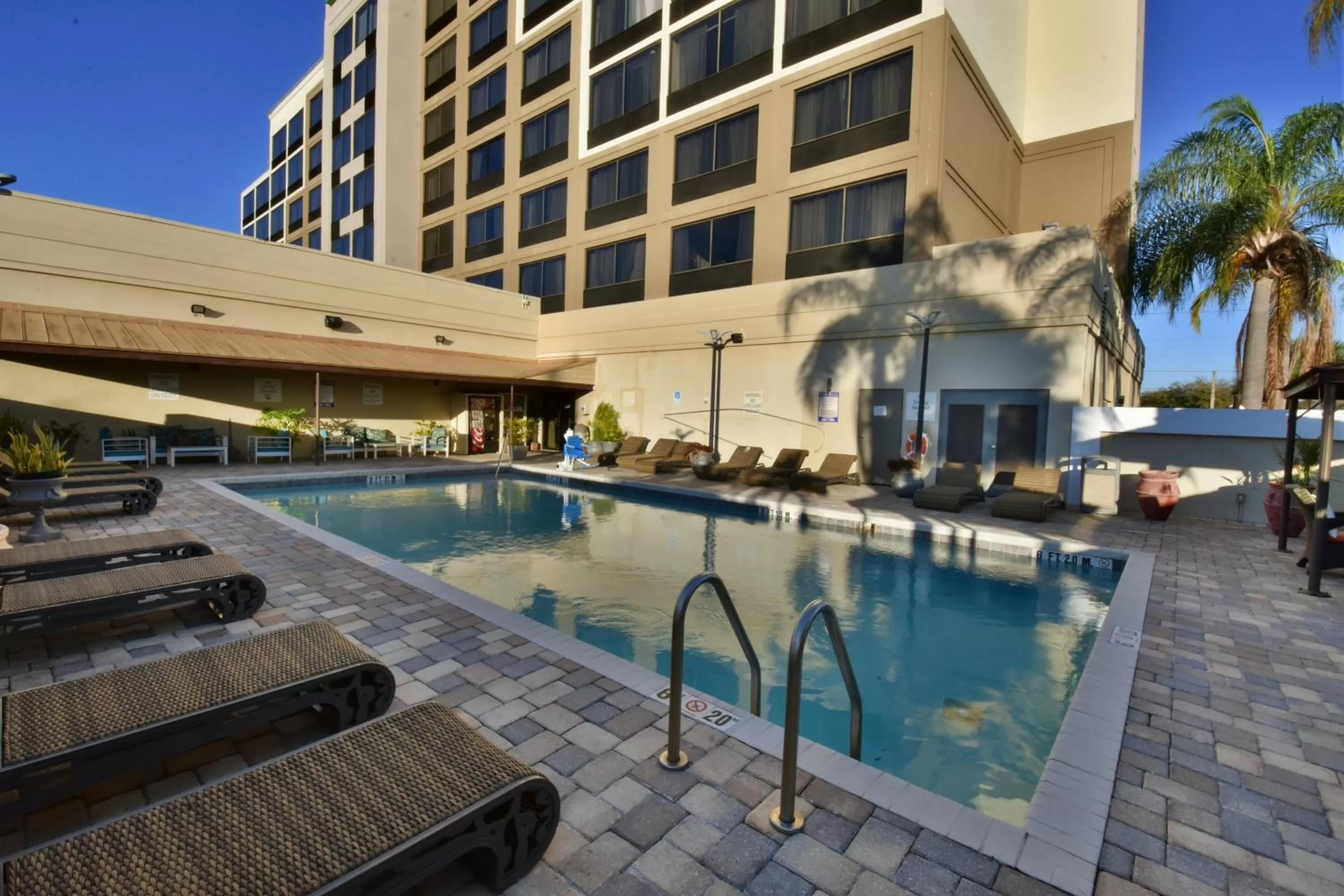 Swimming pool in Holiday Inn Orlando East-UCF Area by IHG