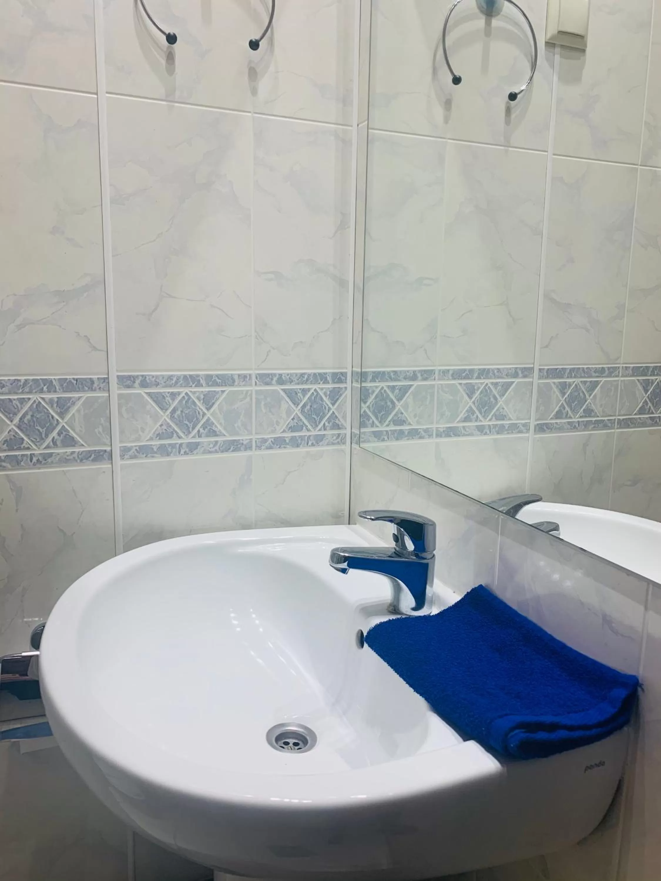 Bathroom in NB Hotel with Free Parking