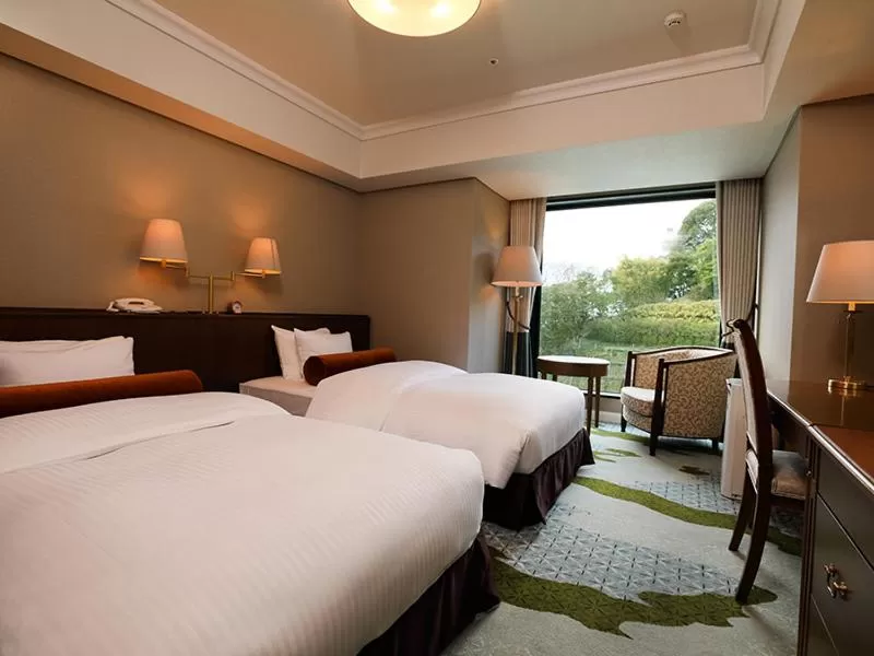 Bed in SHIROYAMA HOTEL kagoshima