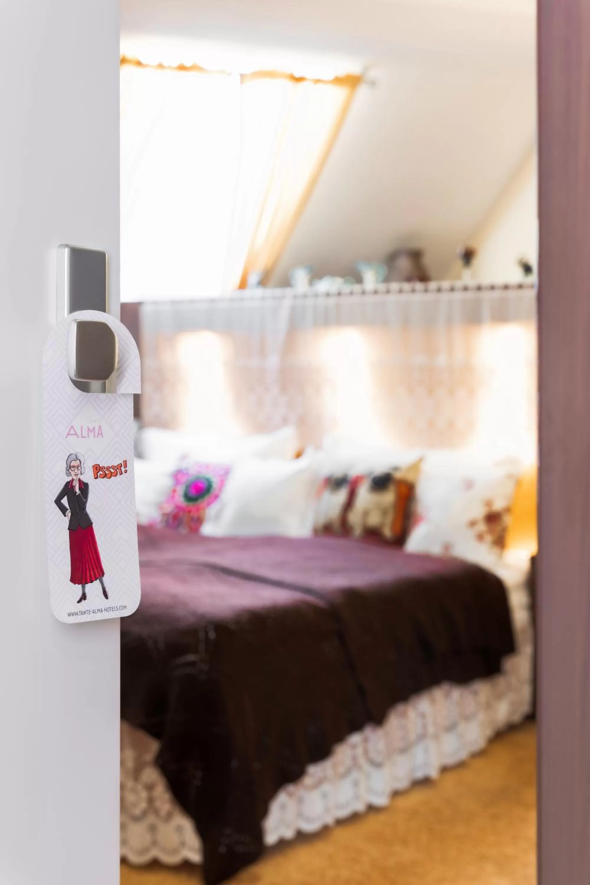 Photo of the whole room, Bed in Tante ALMA's Mannheimer Hotel