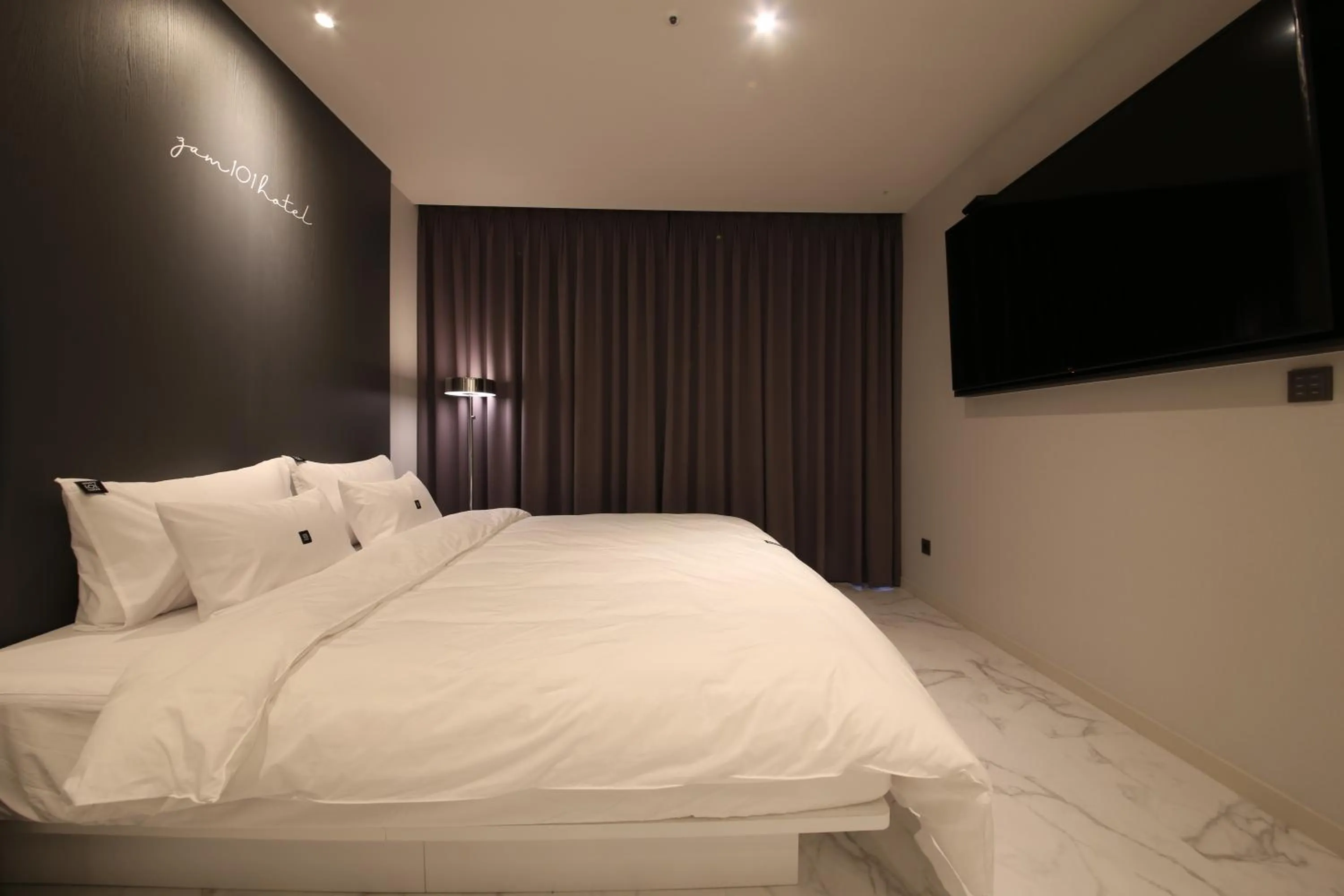 Bed in Zam101 Hotel Gimhae