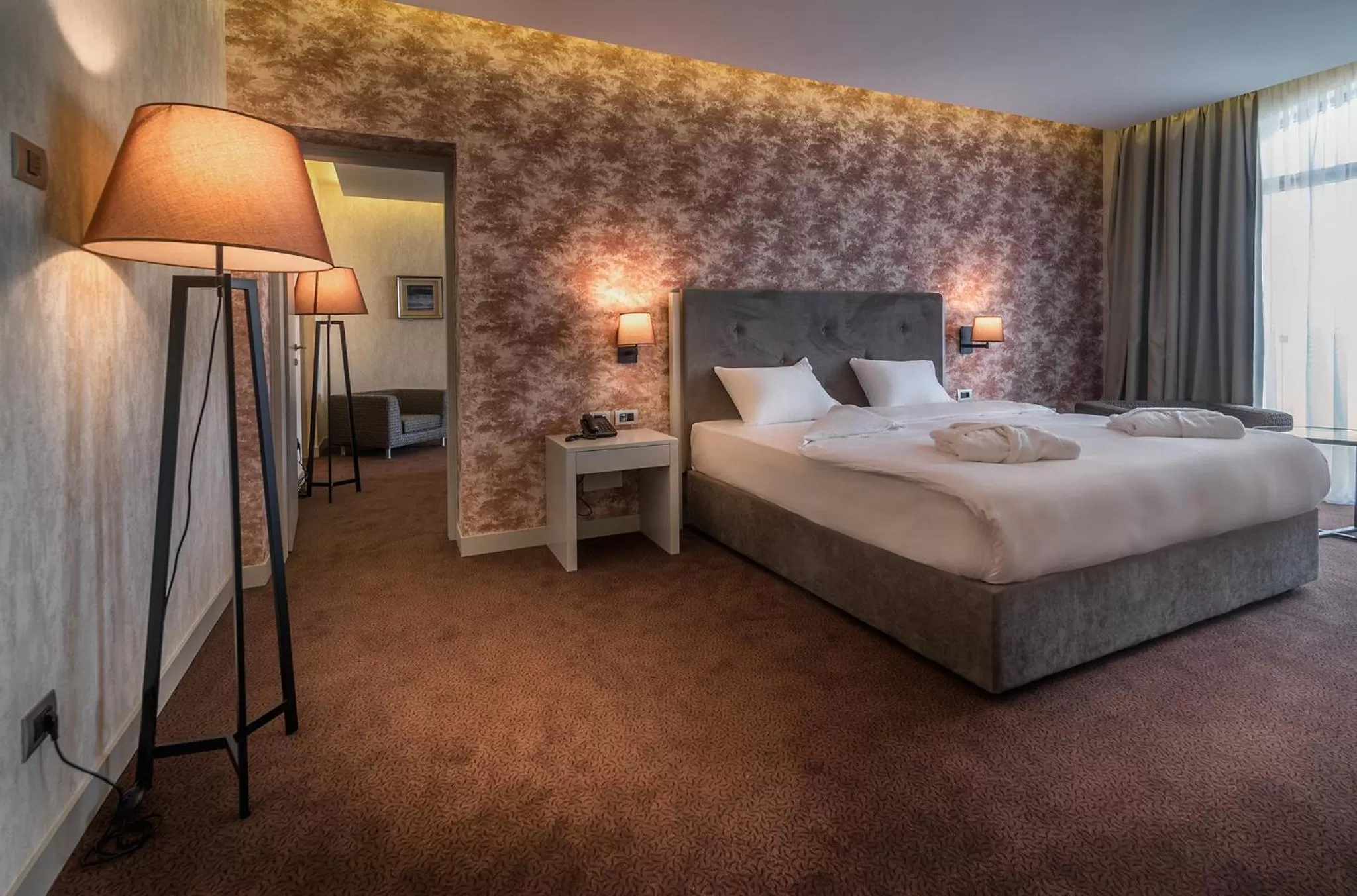 Bed in The Grand Gloria Hotel