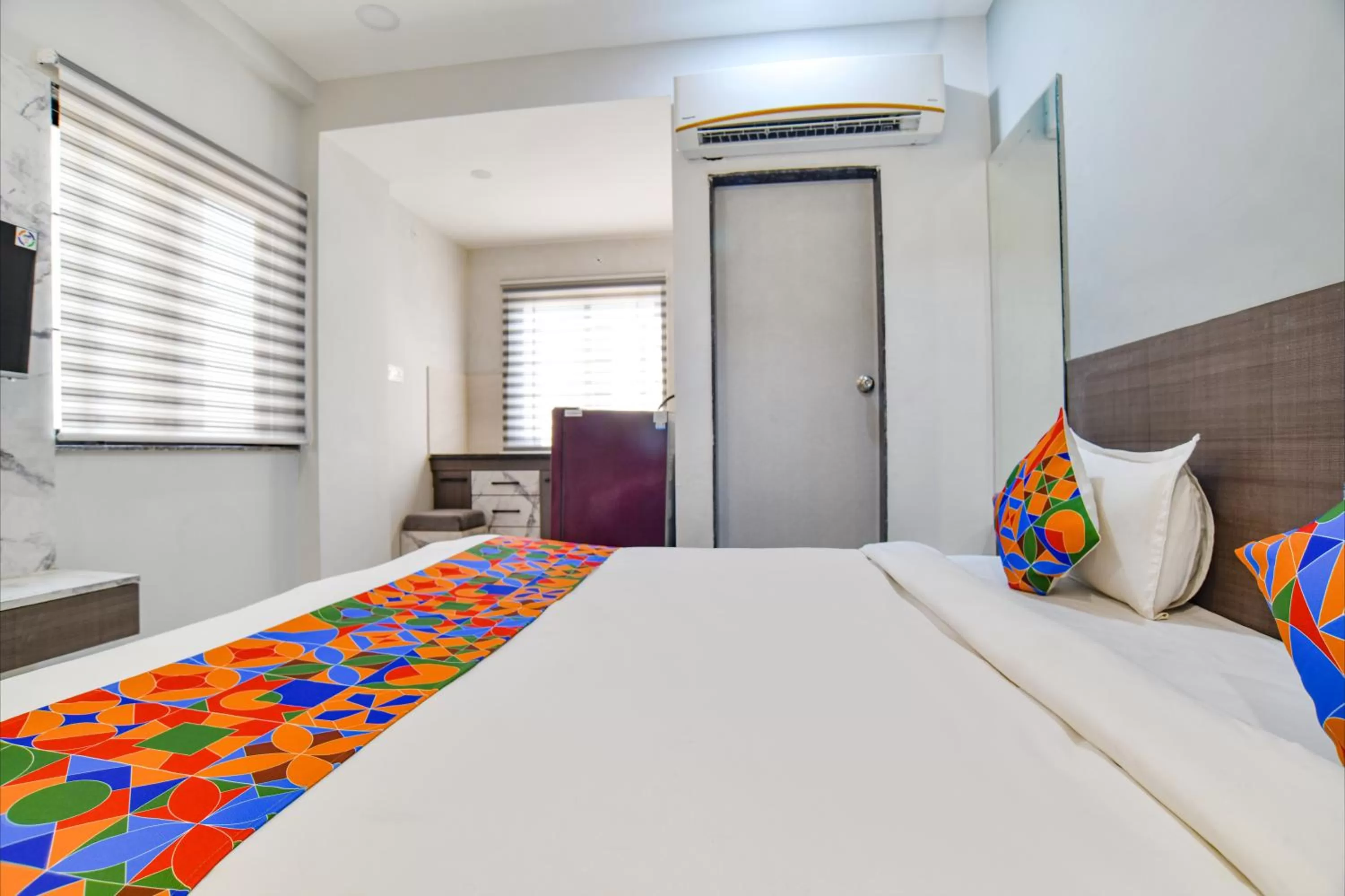 Photo of the whole room, Bed in Fabhotel Grand Blue