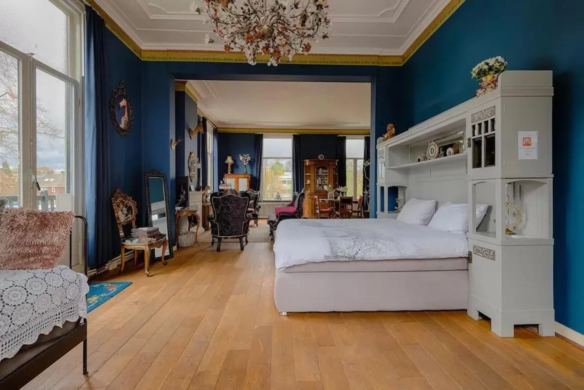 Bed, Seating Area in Villa Dalenstein