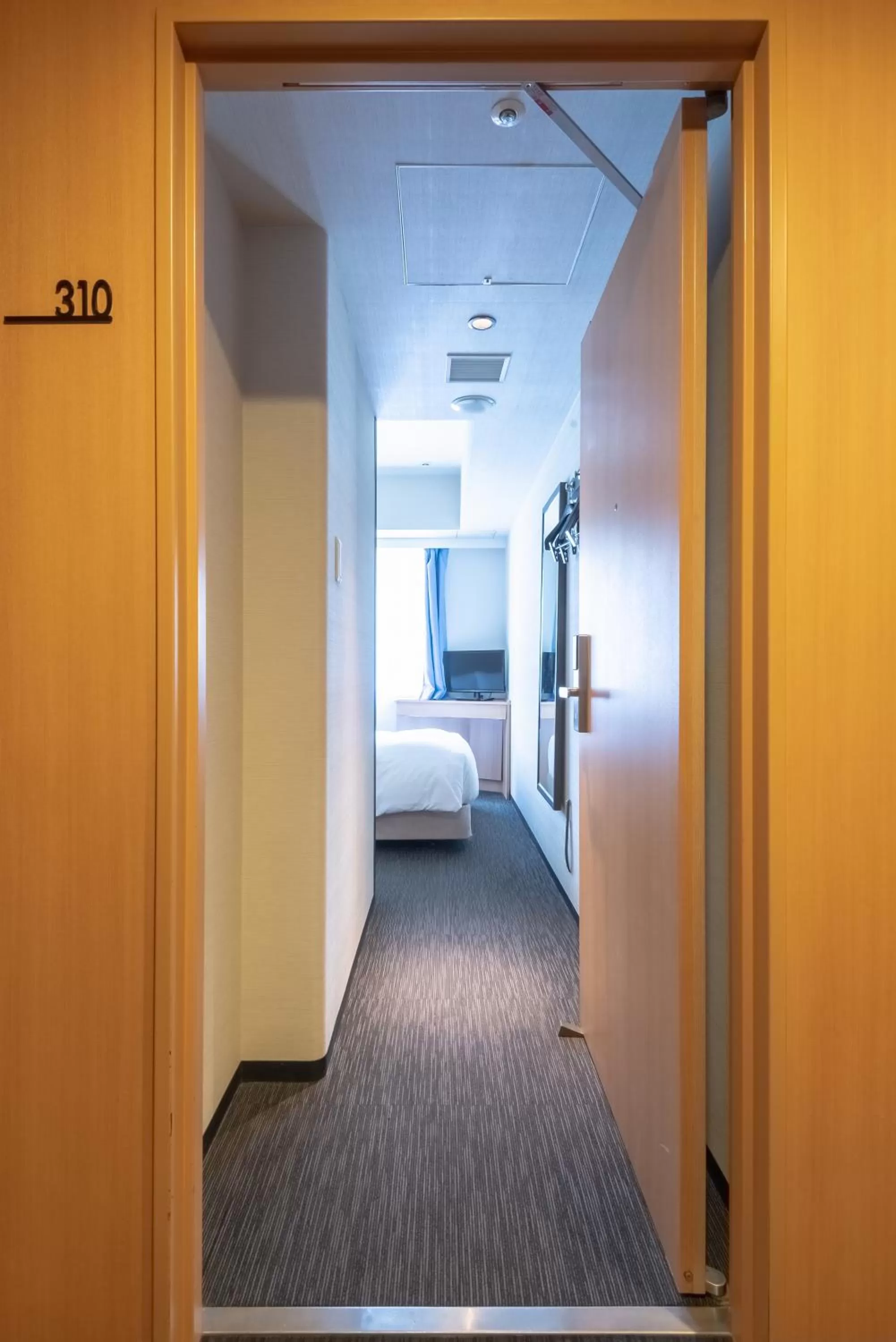 Decorative detail, Bed in E Hotel Higashi Shinjuku