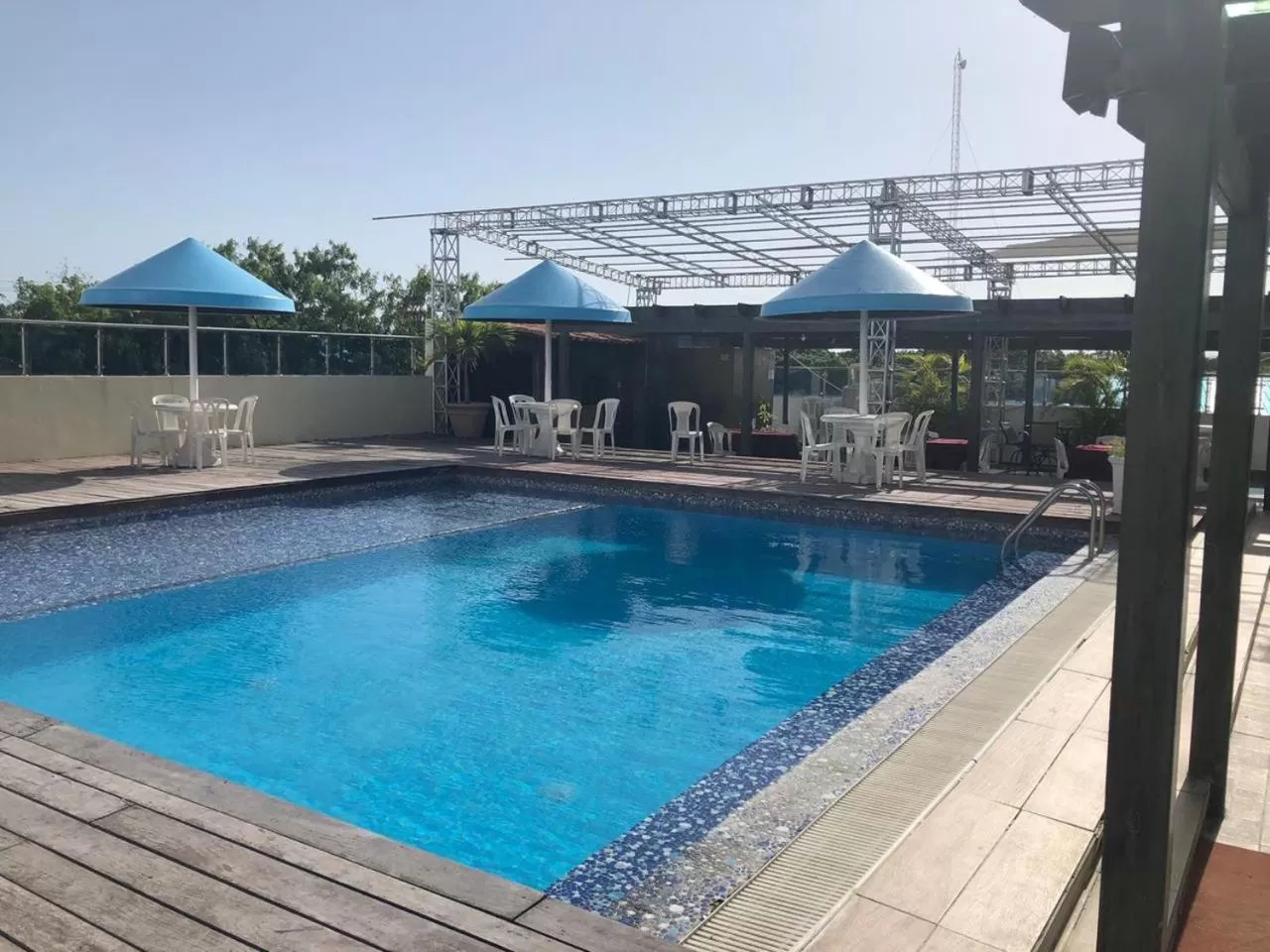 Property building in Golden House Hotel & Convention Center