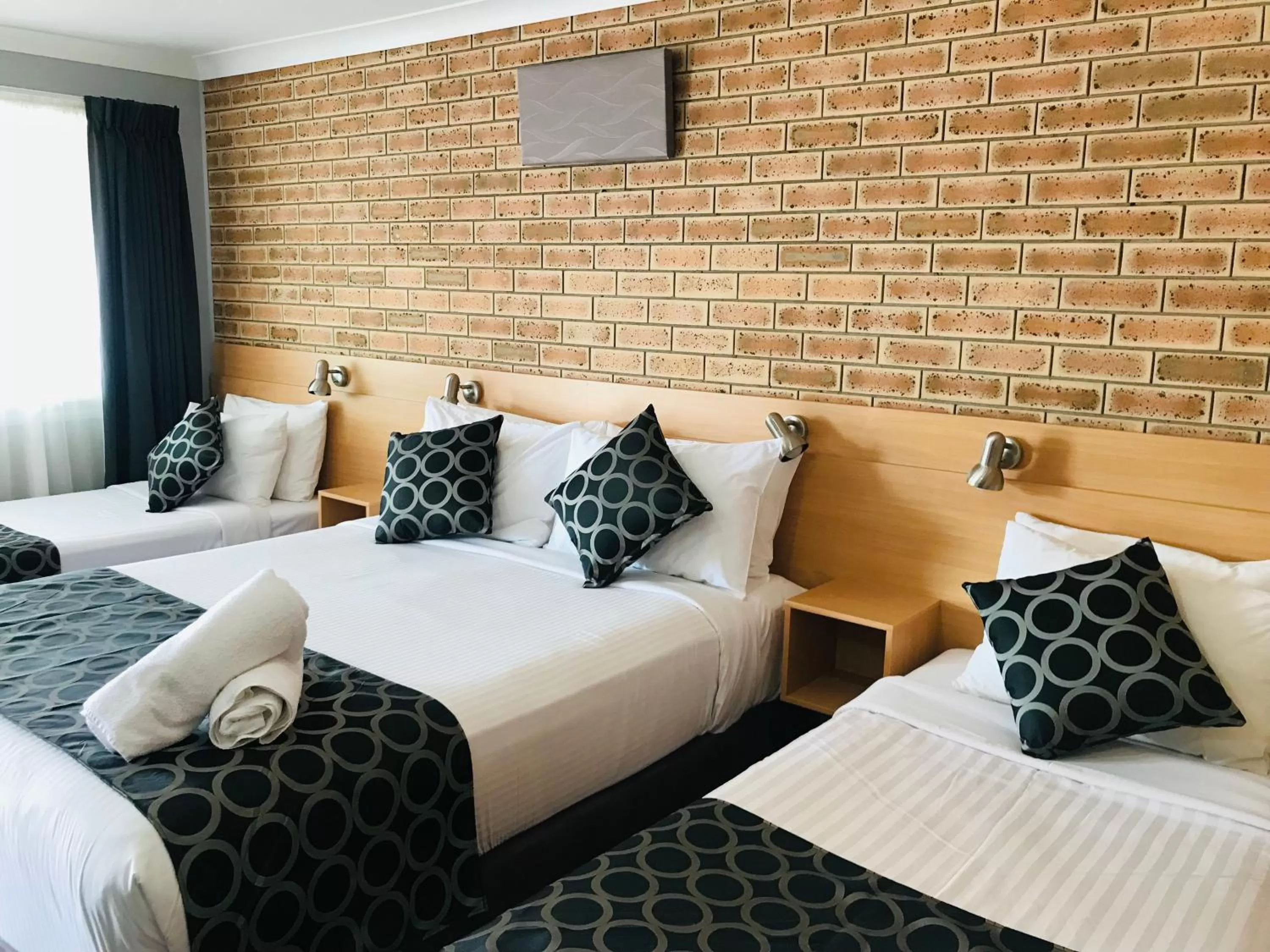 Bed in Jumbuck Motor Inn