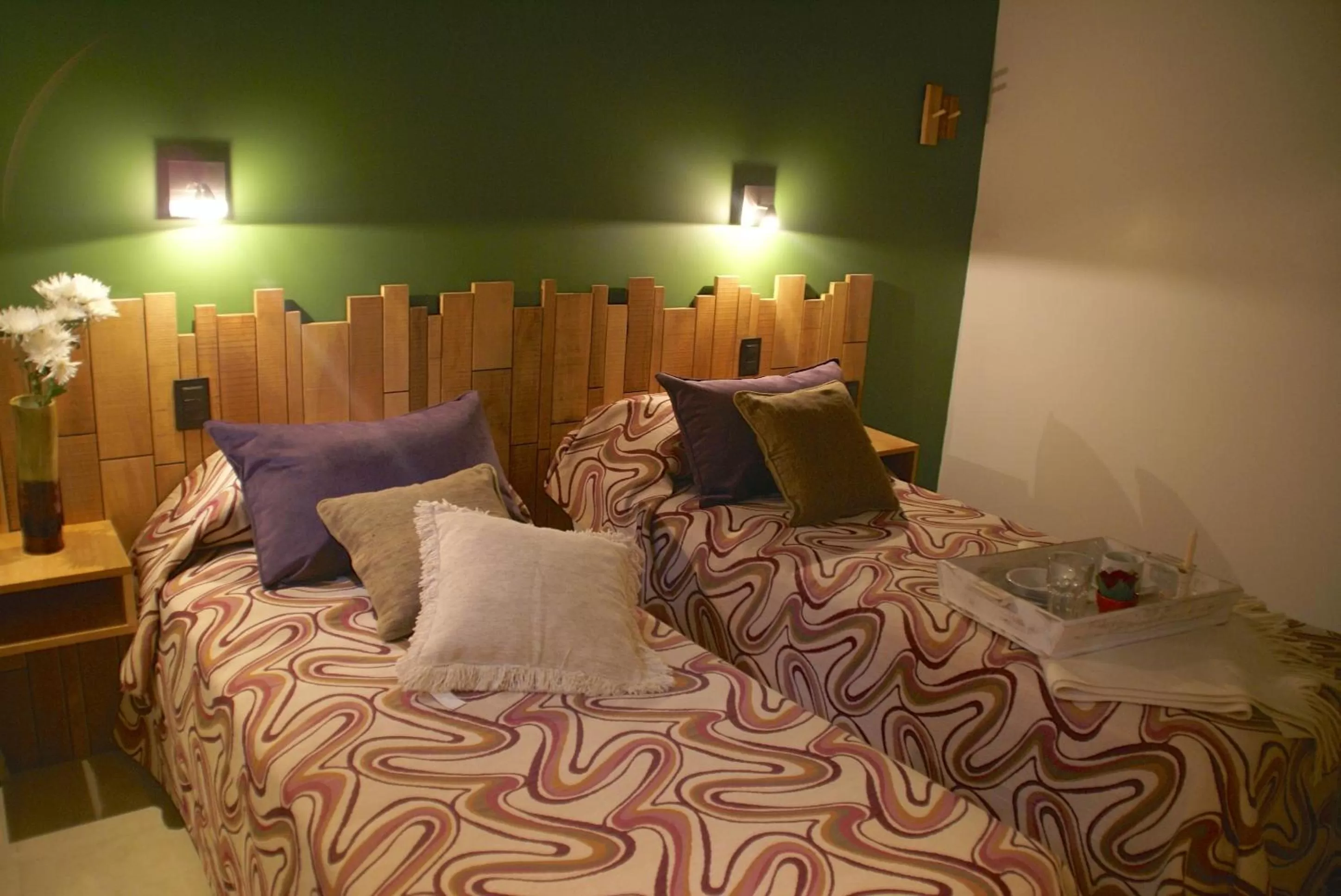 Bed in El Oasis Apart Hotel