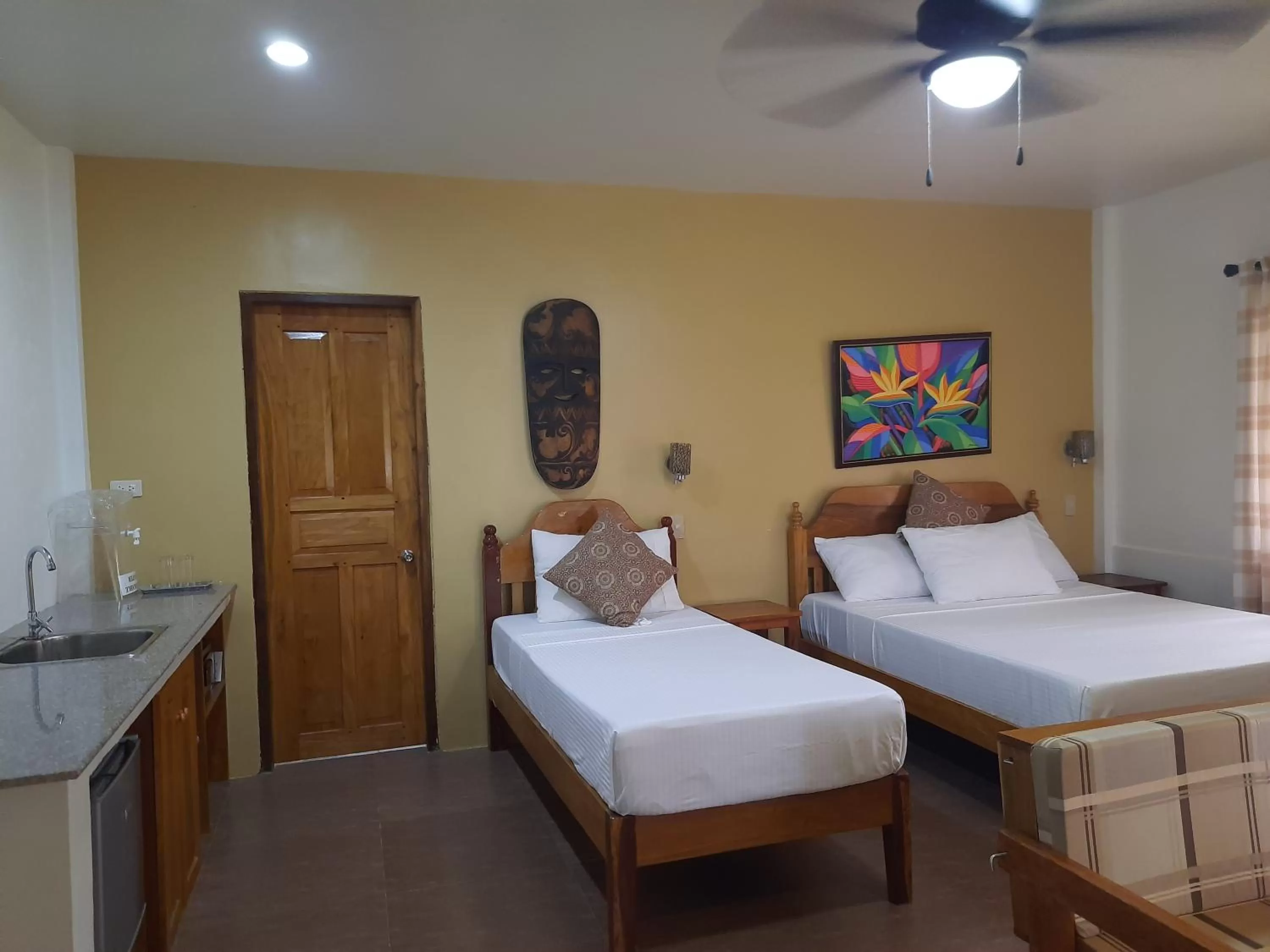 Photo of the whole room, Bed in Eastwind Beach Club- El Nido