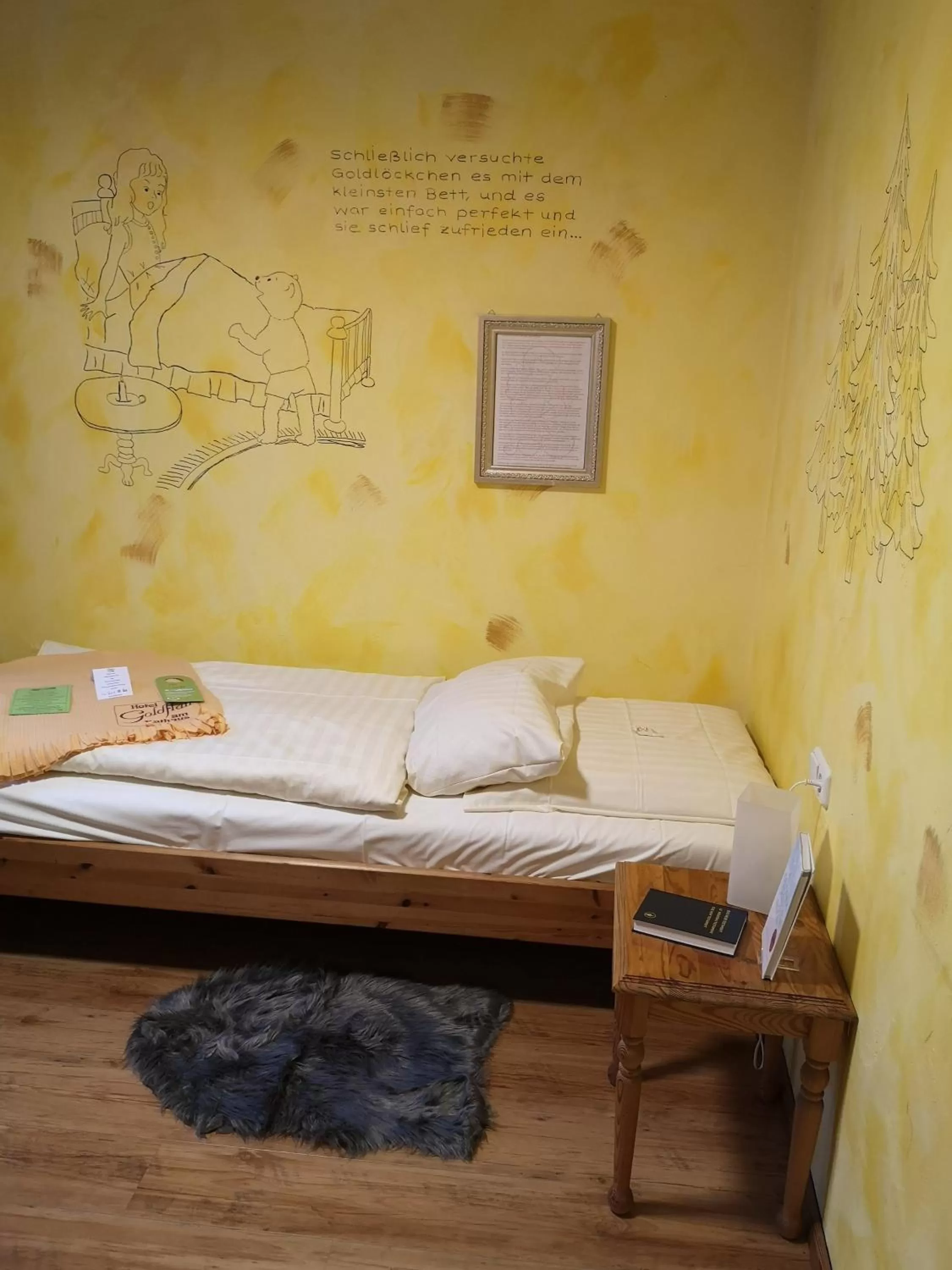 Photo of the whole room, Bed in Hotel Goldflair am Rathaus