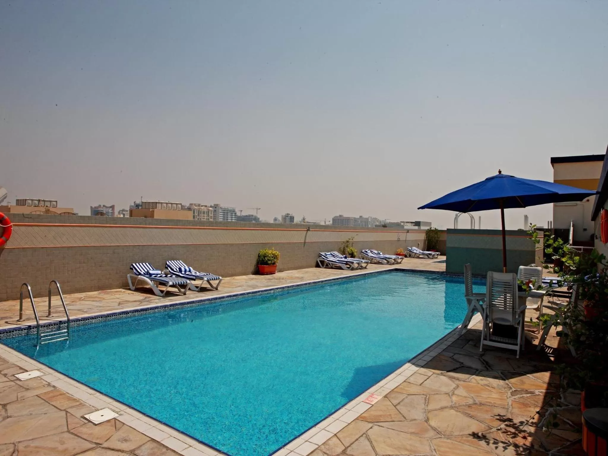 Swimming pool in Rose Garden Hotel Apartments - Al Barsha, Near Metro Station