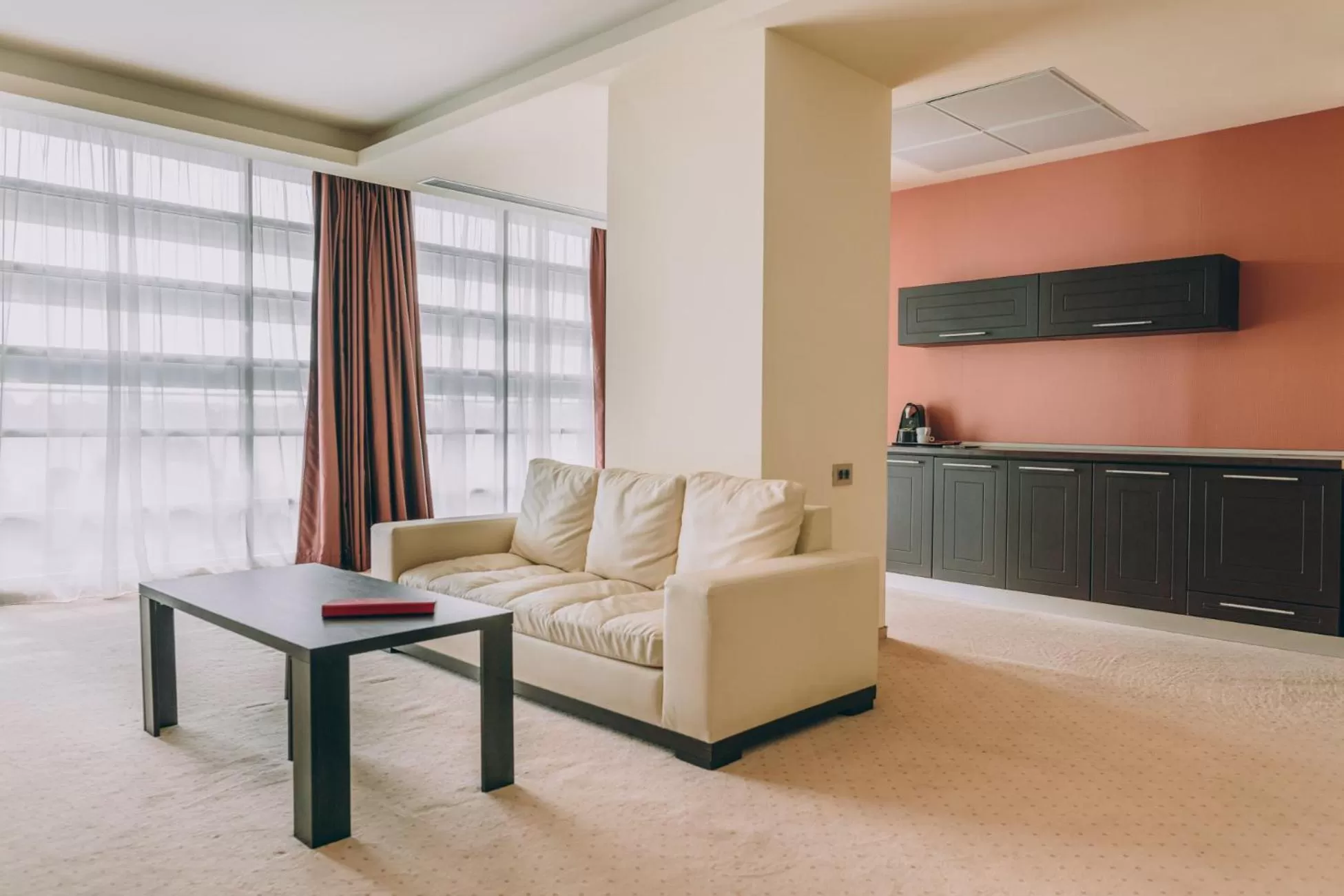 Living room in Ramada by Wyndham Constanta