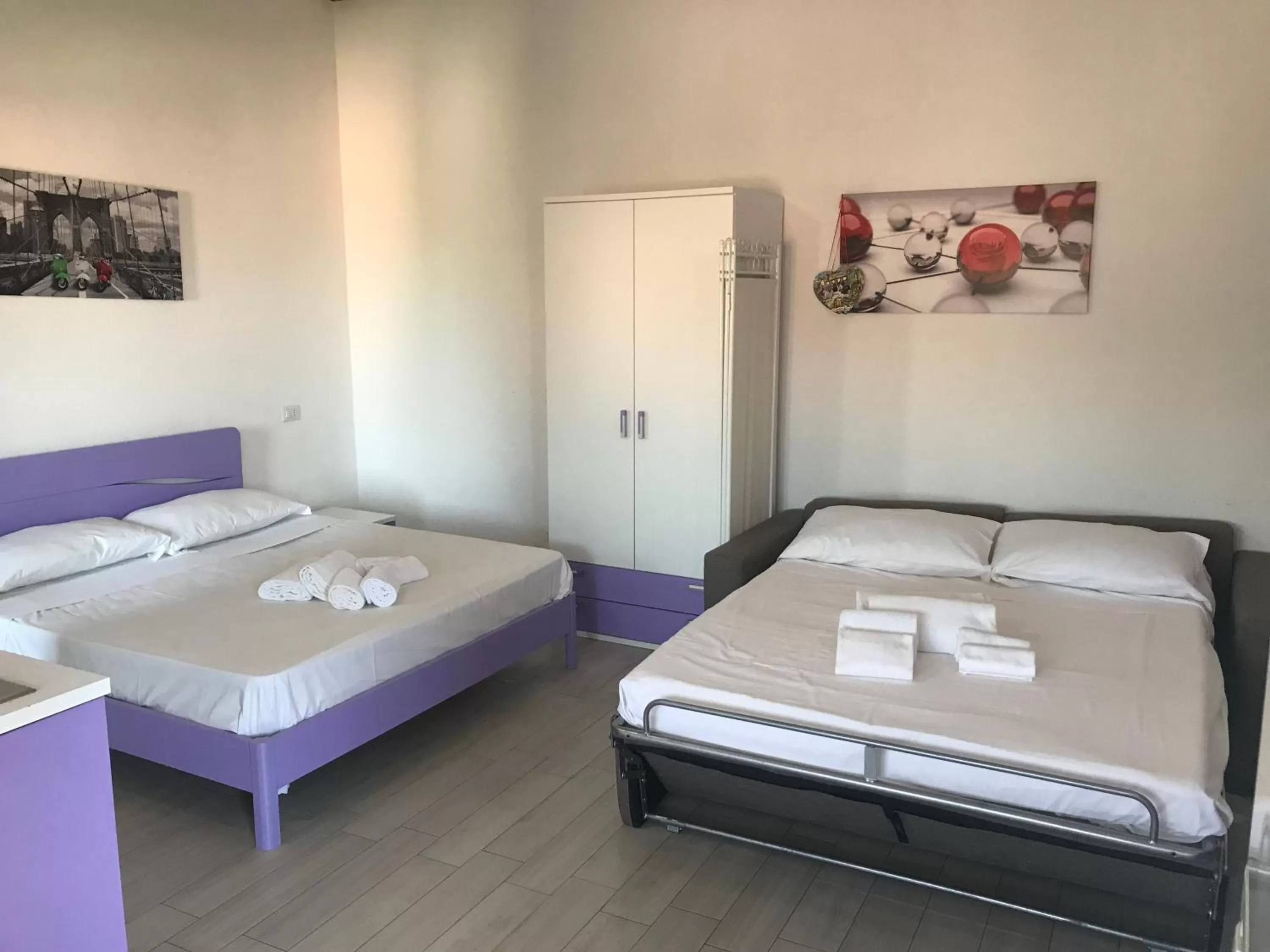 Bed in QUADRIFOGLIO Affittacamere