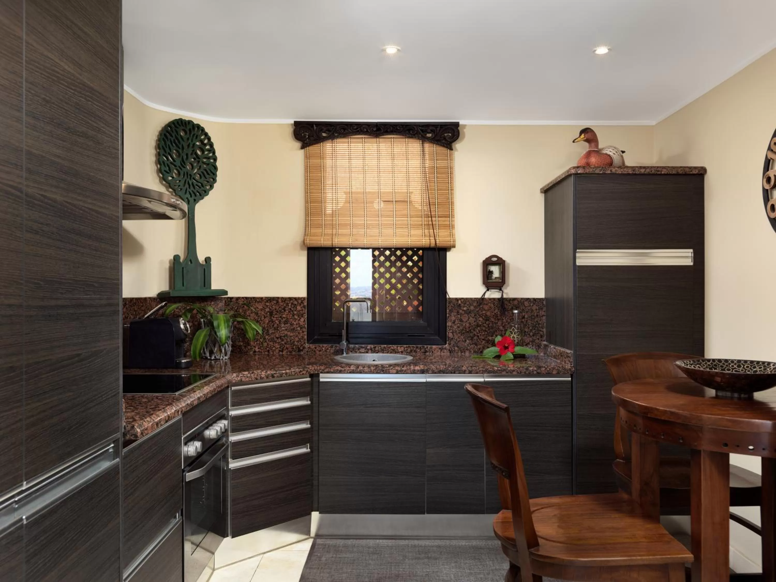 Kitchen or kitchenette in Royal Garden Villas, Luxury Hotel