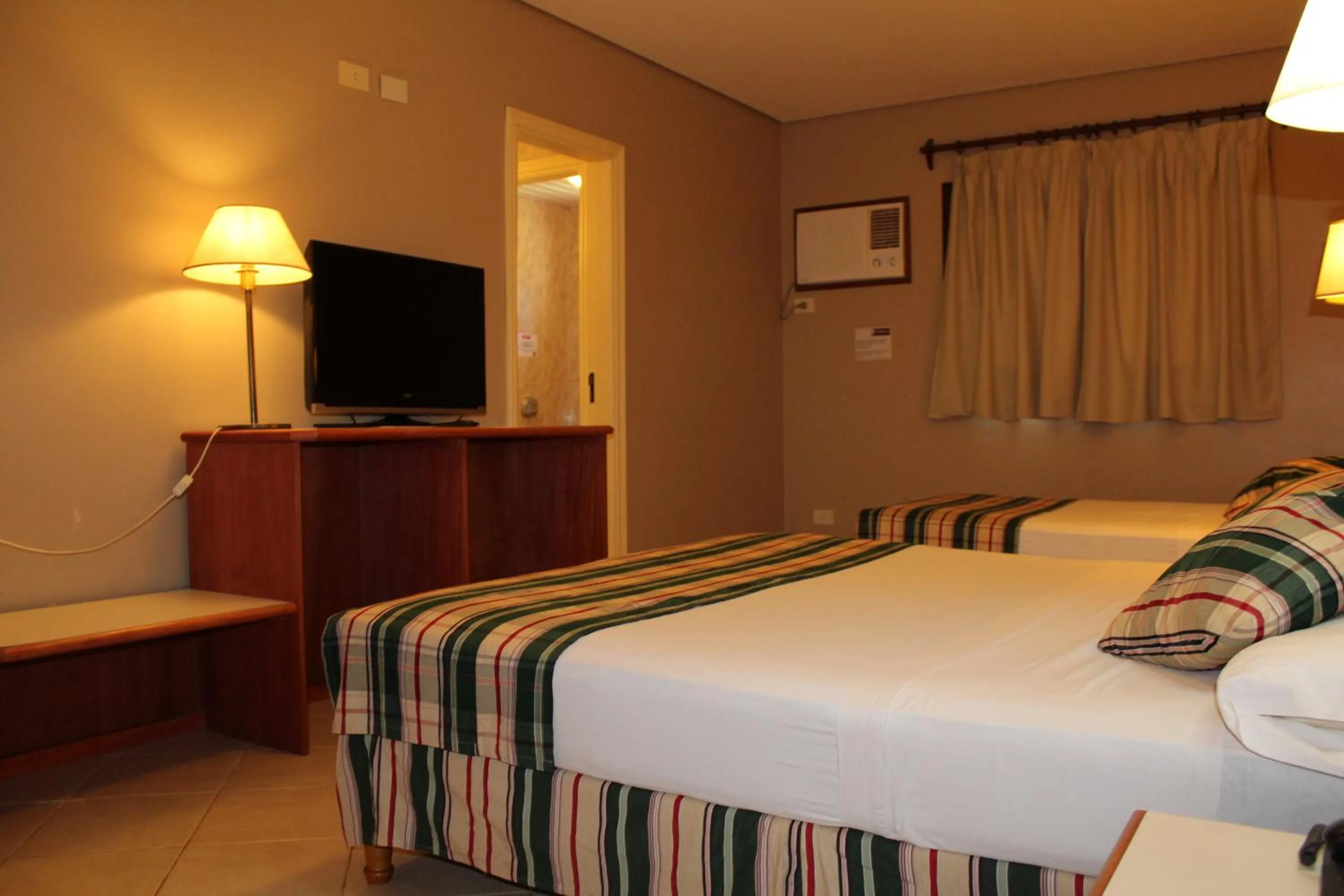 Photo of the whole room, Bed in Marcopolo Suites Iguazu