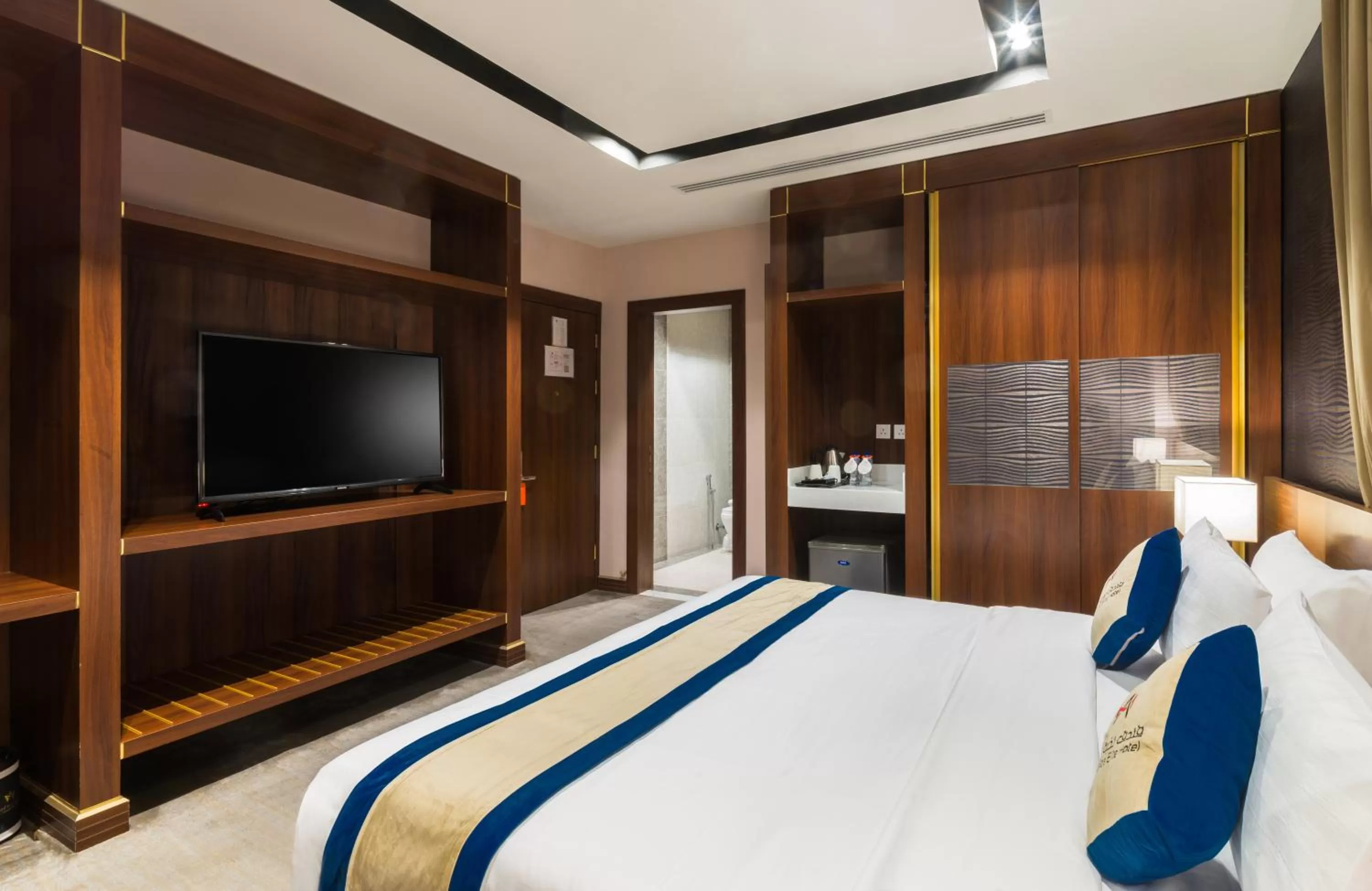 Bed in Al Malqa Elite Hotel