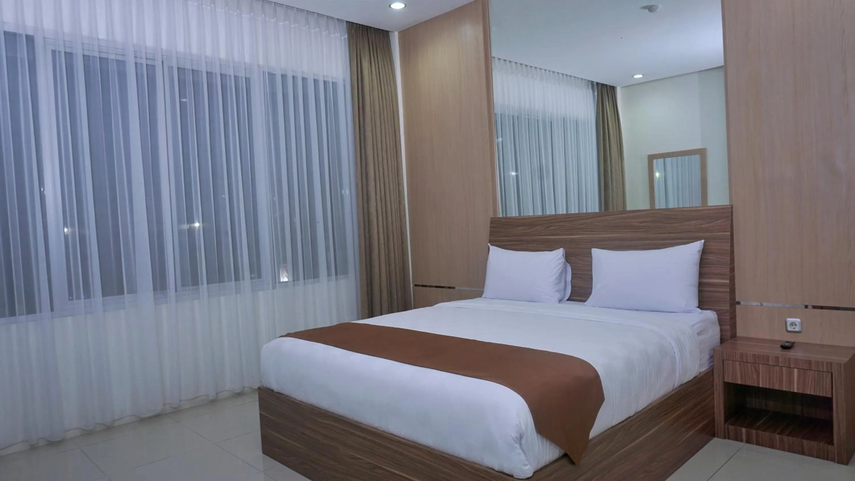 Photo of the whole room, Bed in Grand Cordela Hotel AS Putra Kuningan