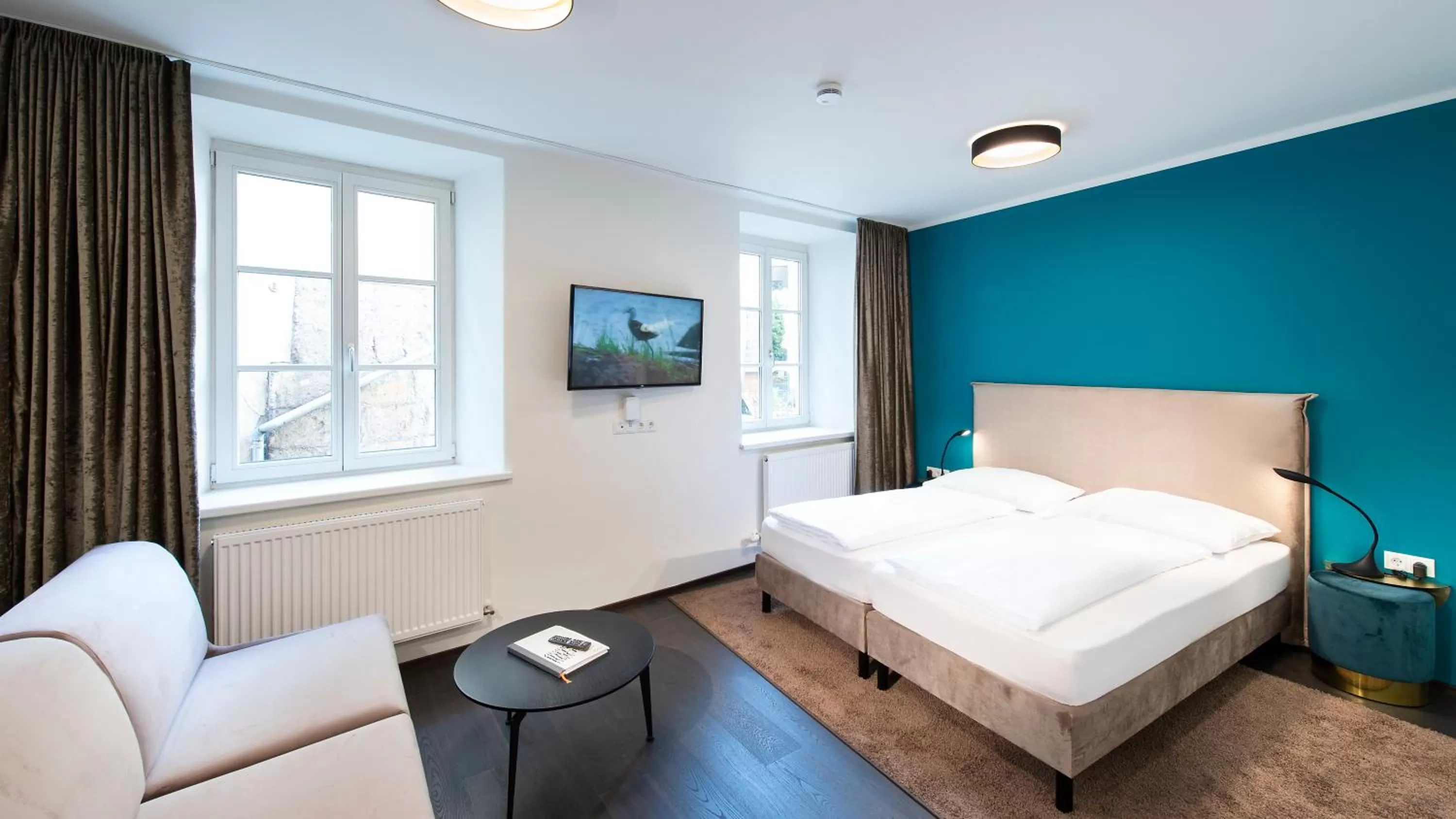 Bed in Blackhome Innsbruck Boutique I contactless check-in