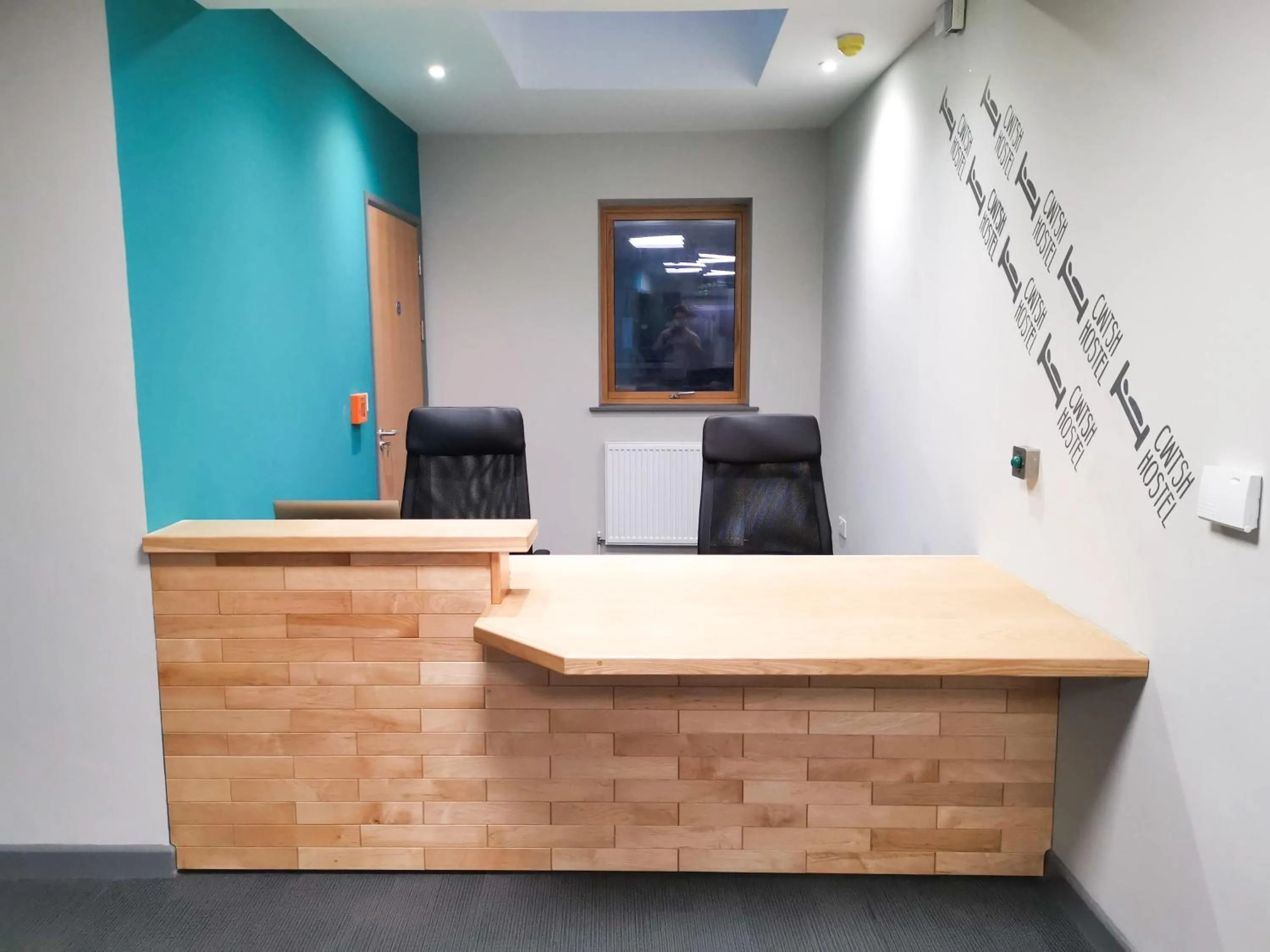 Lobby or reception in Cwtsh Hostel