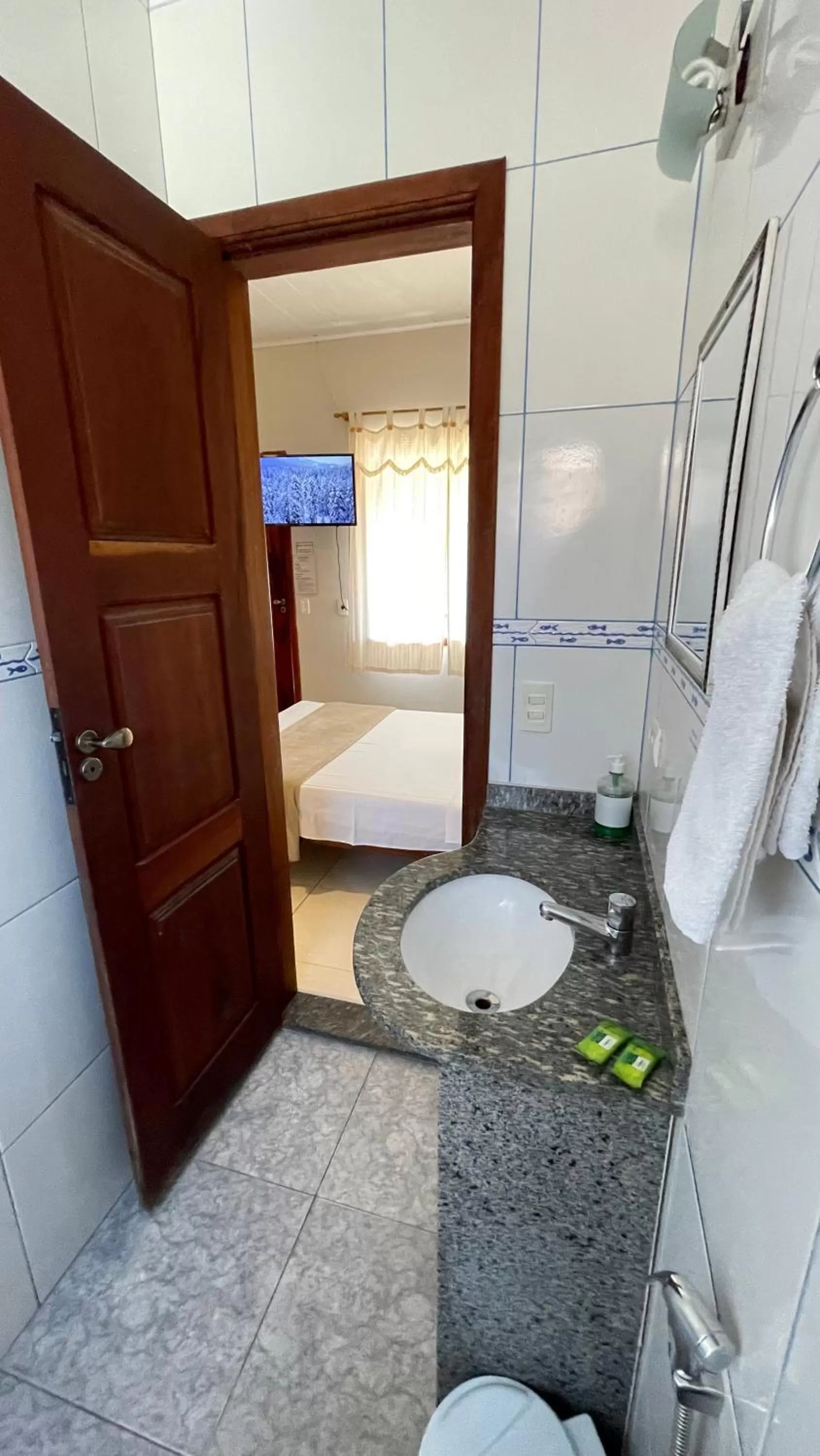 Bathroom, Bed in Pousada Brisa do Leste
