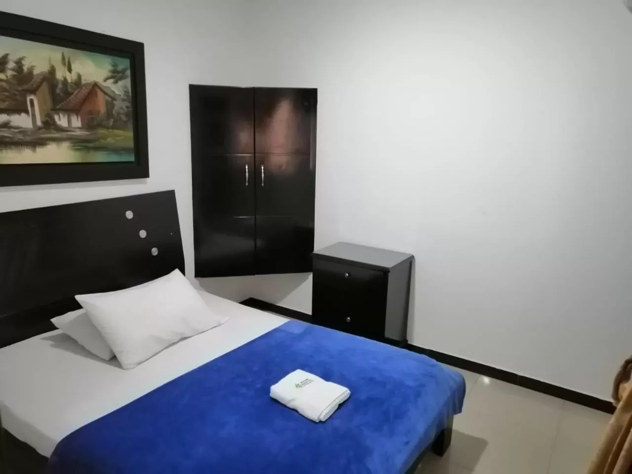 Bed in Hotel Palmeras De Mariana