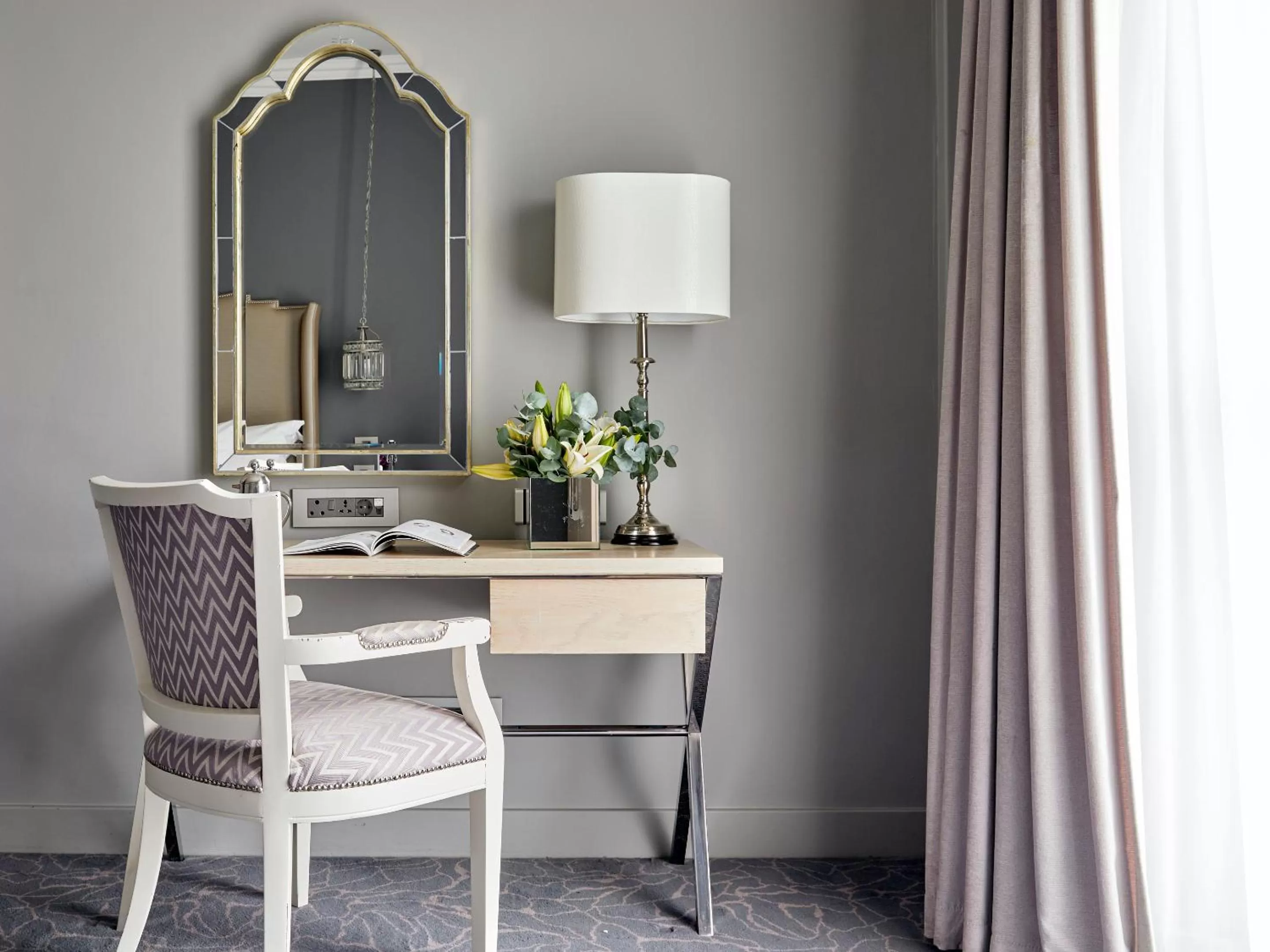 Seating area in Queen Victoria Hotel by NEWMARK