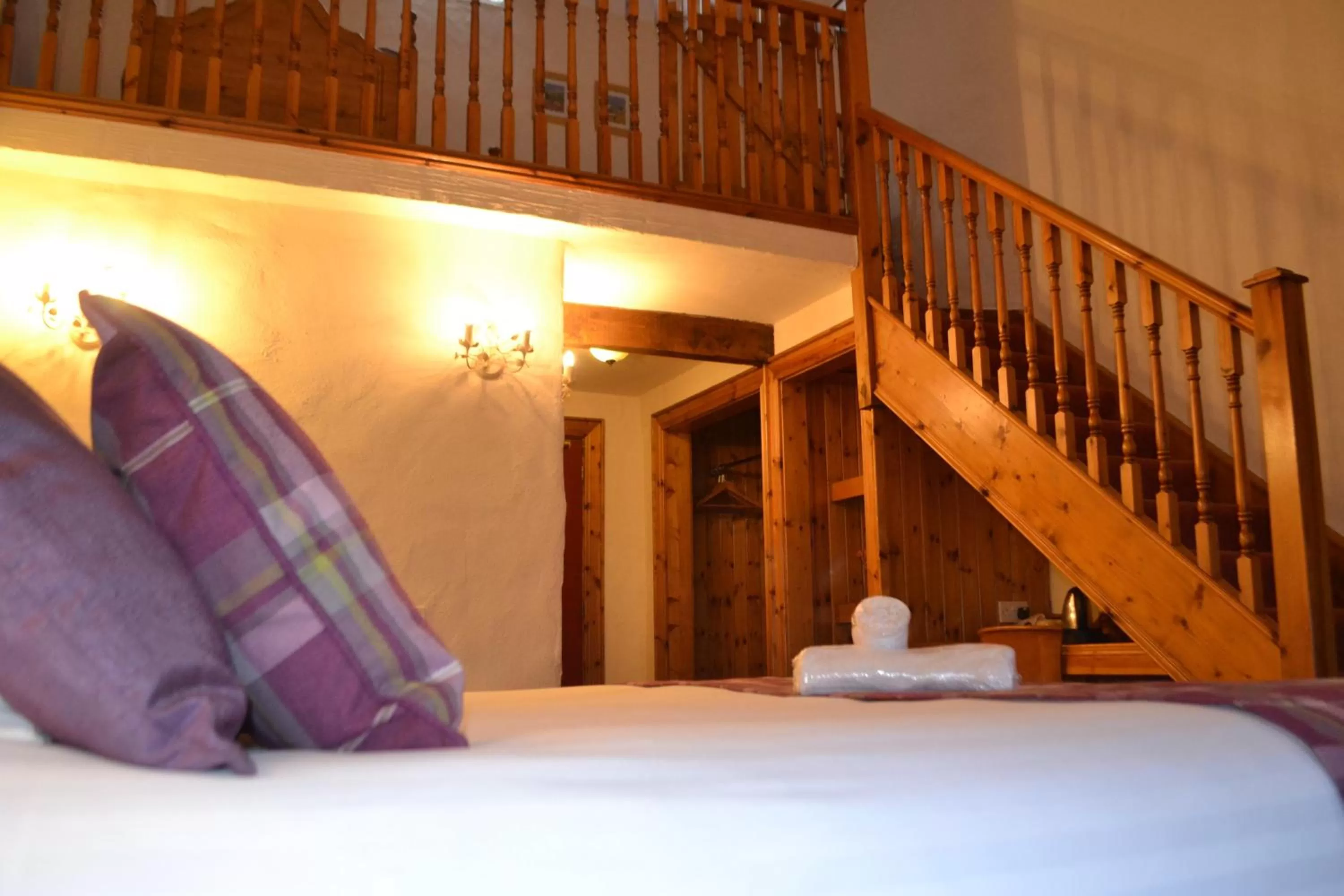 Bed in Walsh's Hotel and Apartments