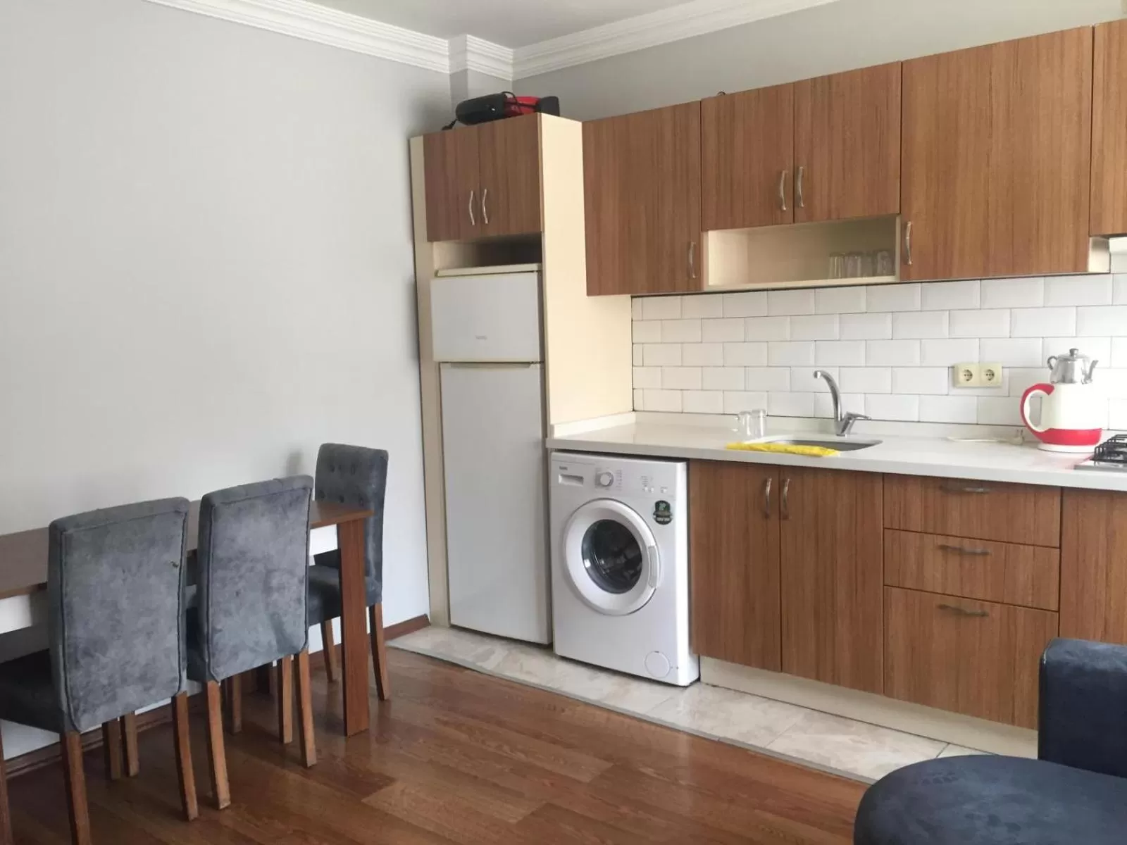 Living room, Kitchen/Kitchenette in Yılmaz Suit Apartments