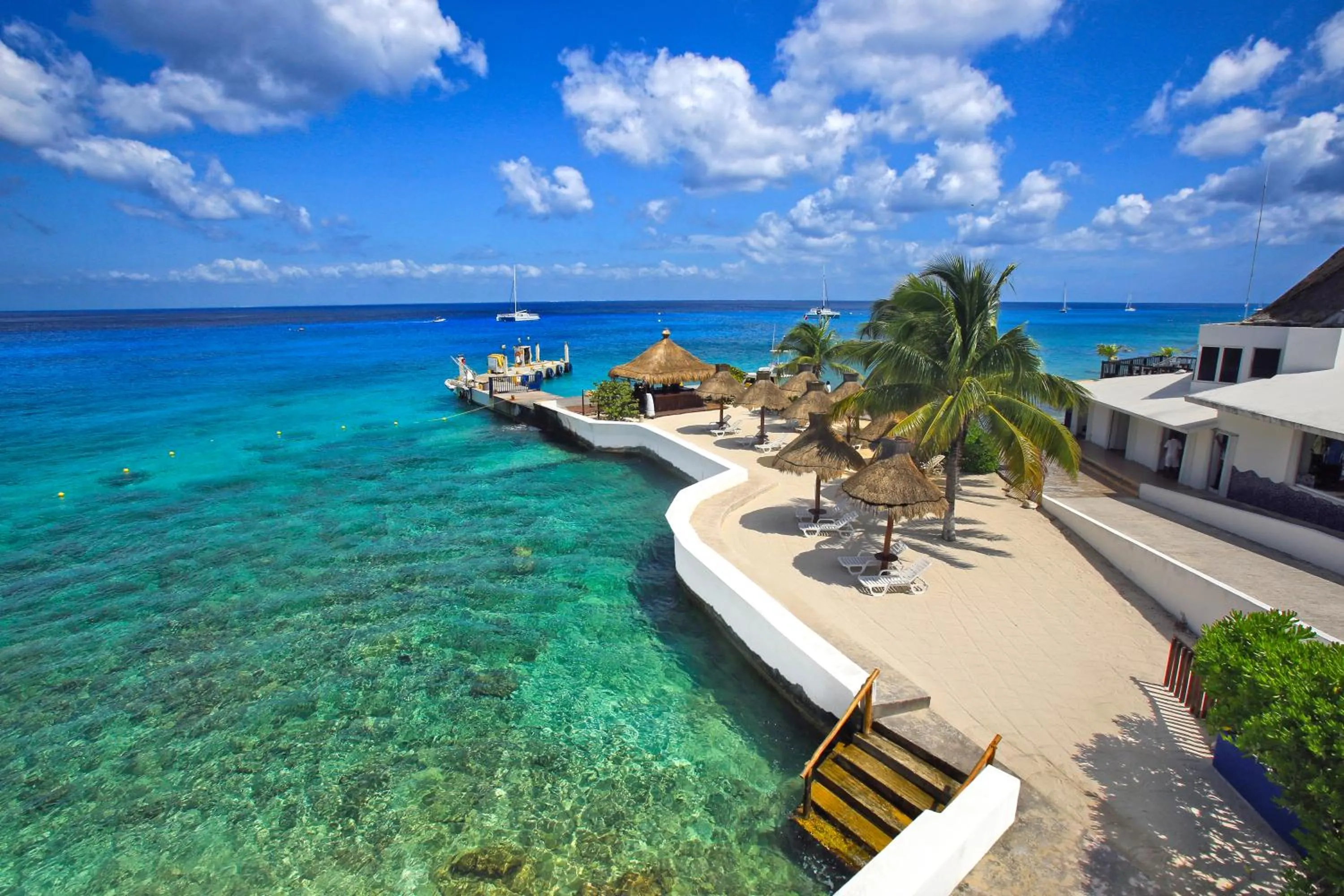 Snorkeling in Casa del Mar Cozumel Hotel & Dive Resort with free access to an exclusive beach club