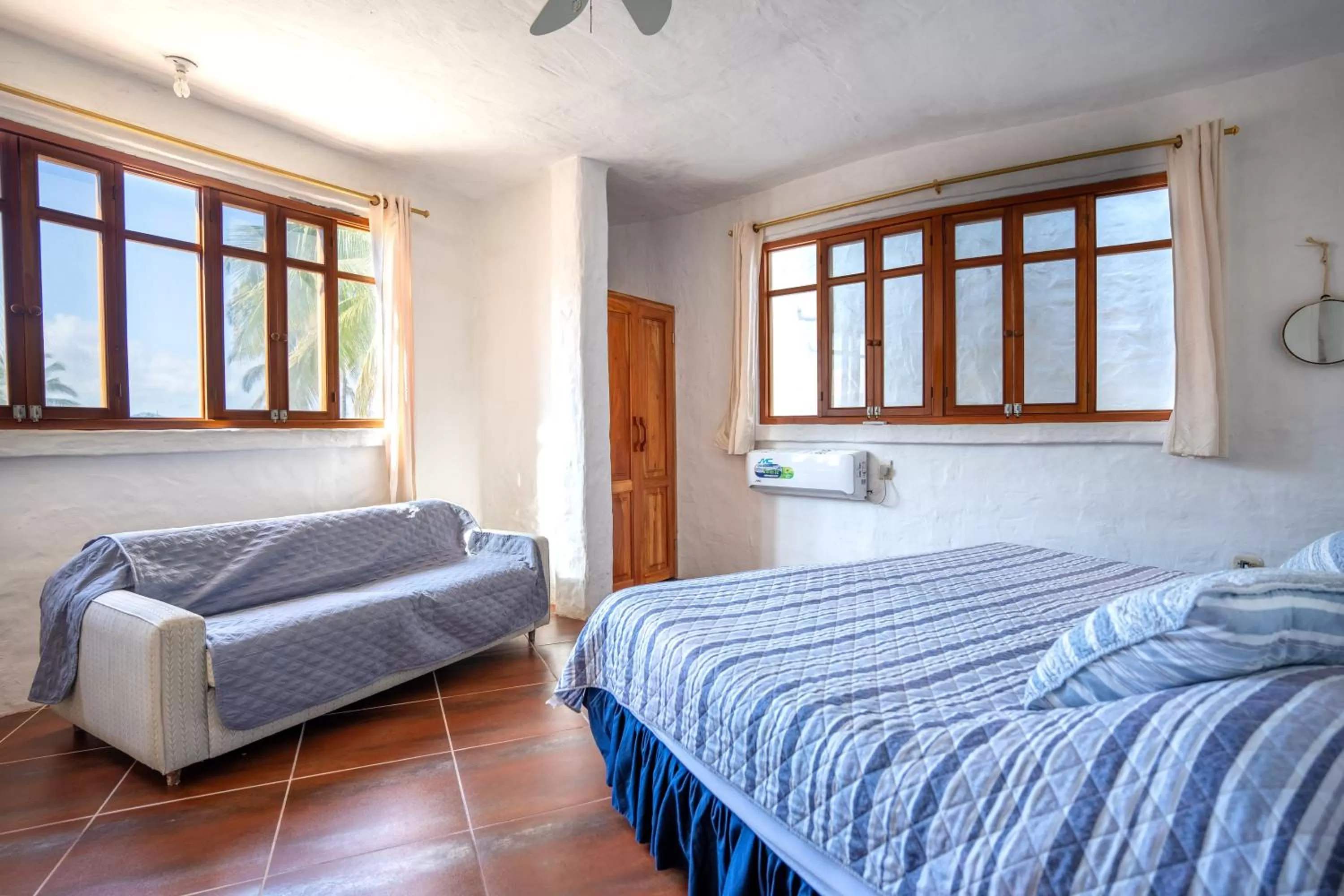 Bed in Hostal Galapagos by Bar de Beto