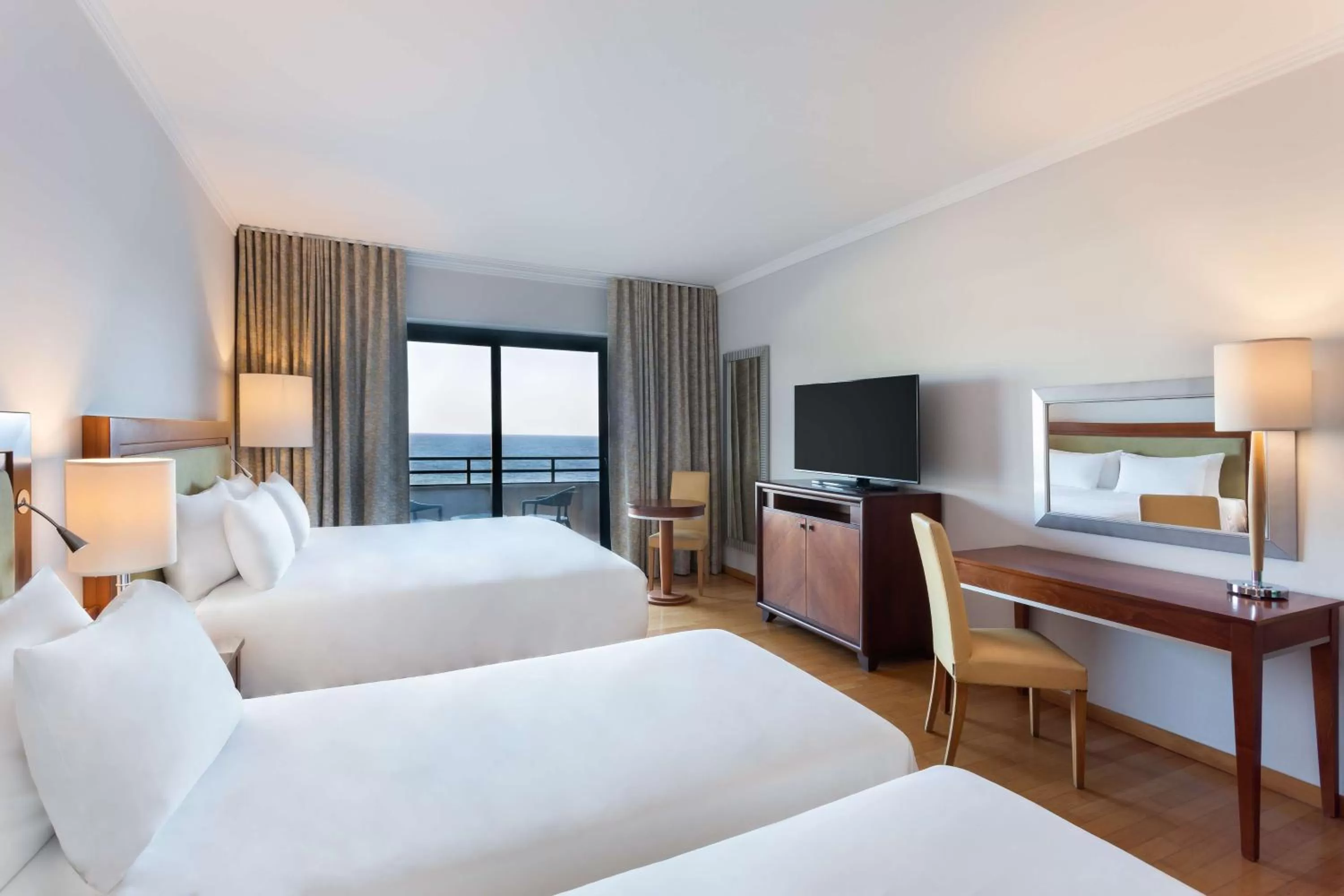 Family Room with Balcony and Sea View in Radisson Blu Resort, Malta St. Julian's