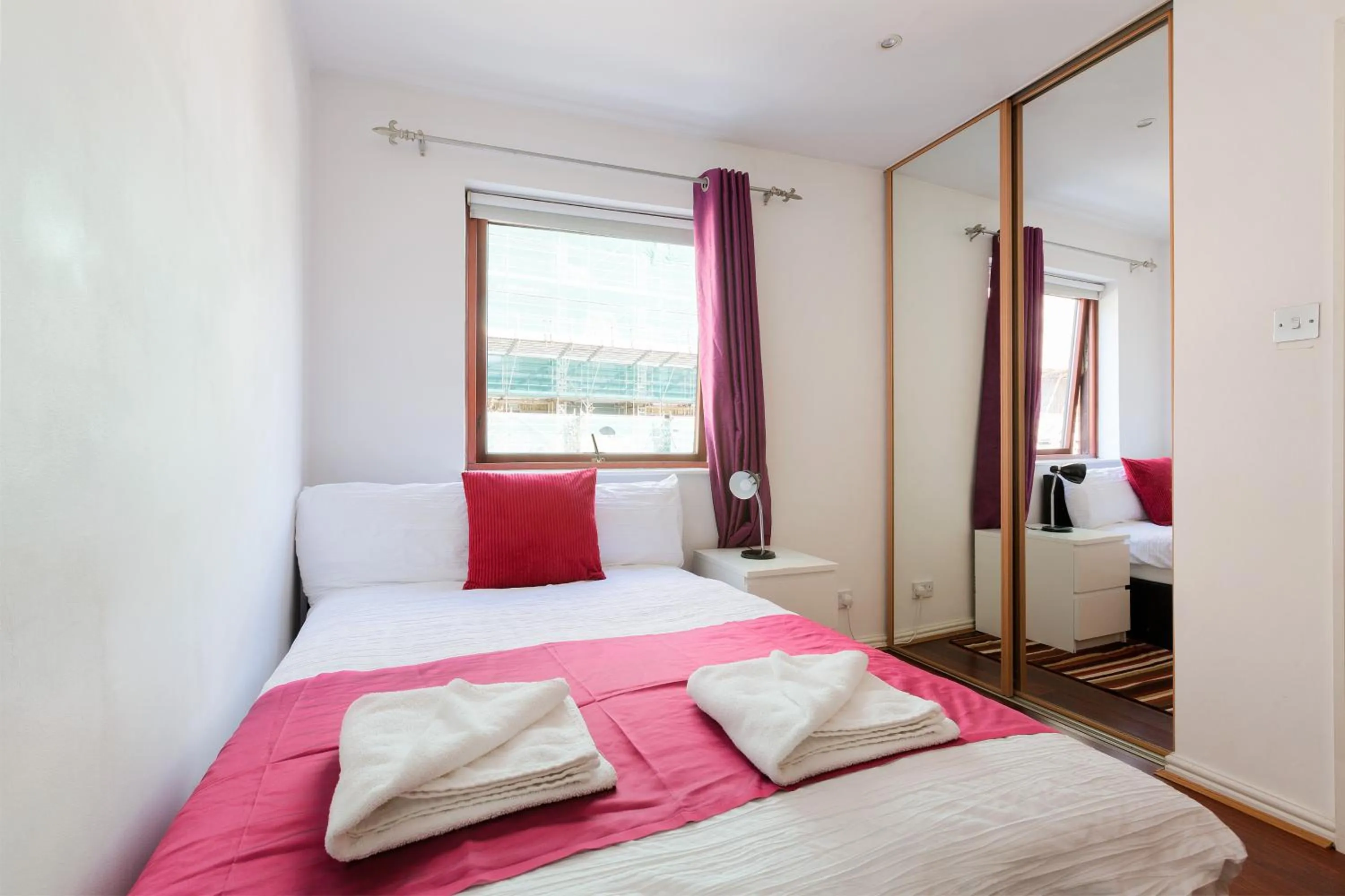 Photo of the whole room, Bed in Centra Wharf