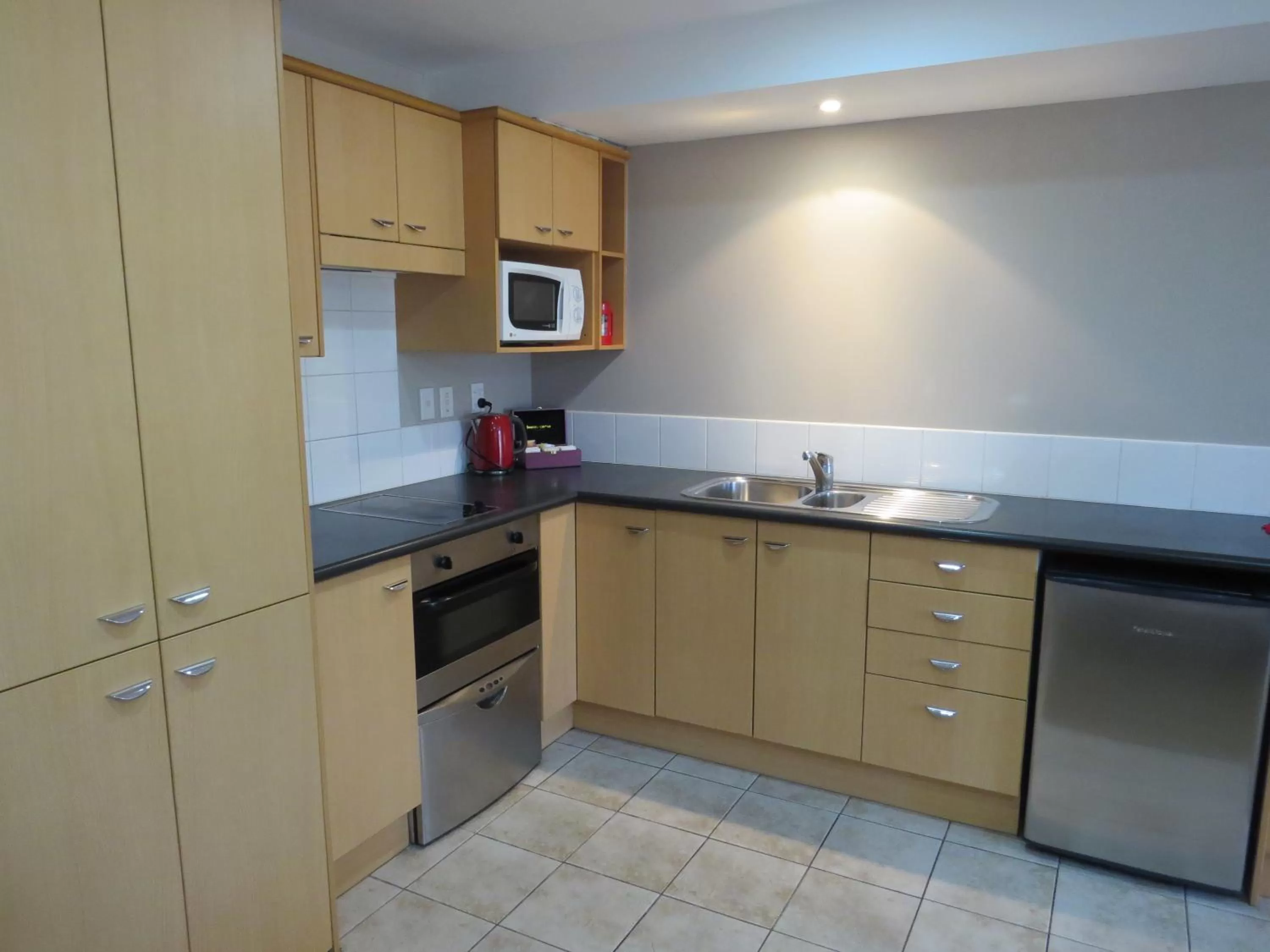 Kitchen or kitchenette in Voyager Apartments Taupo