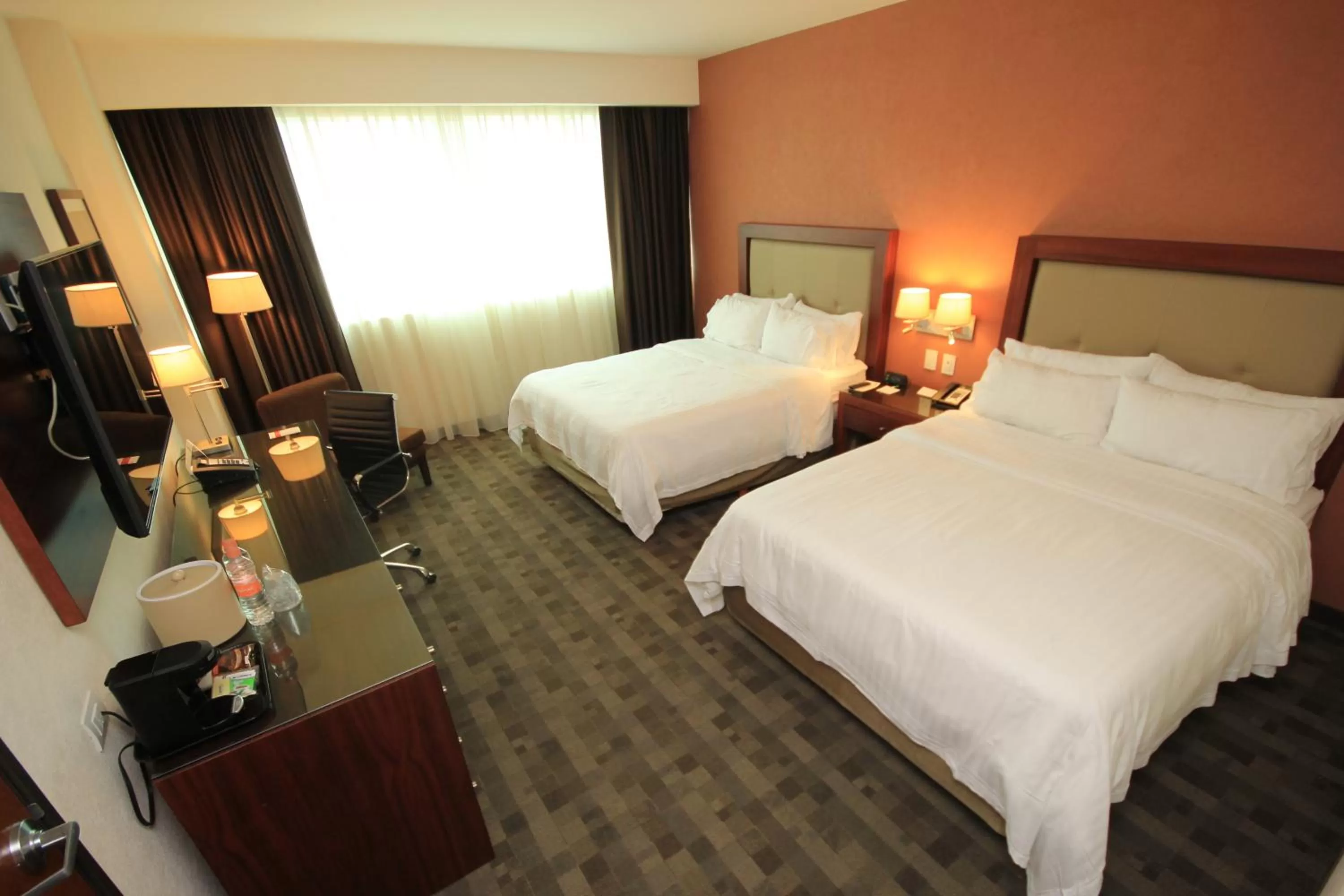 Photo of the whole room, Bed in Holiday Inn & Suites Plaza Mayor by IHG