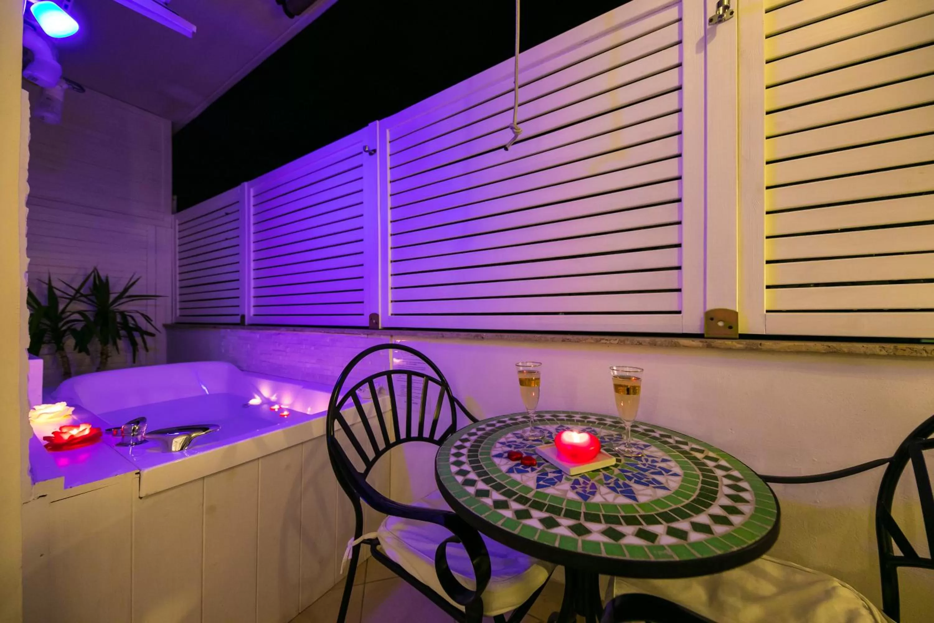 Photo of the whole room in Suites Roma Tiburtina